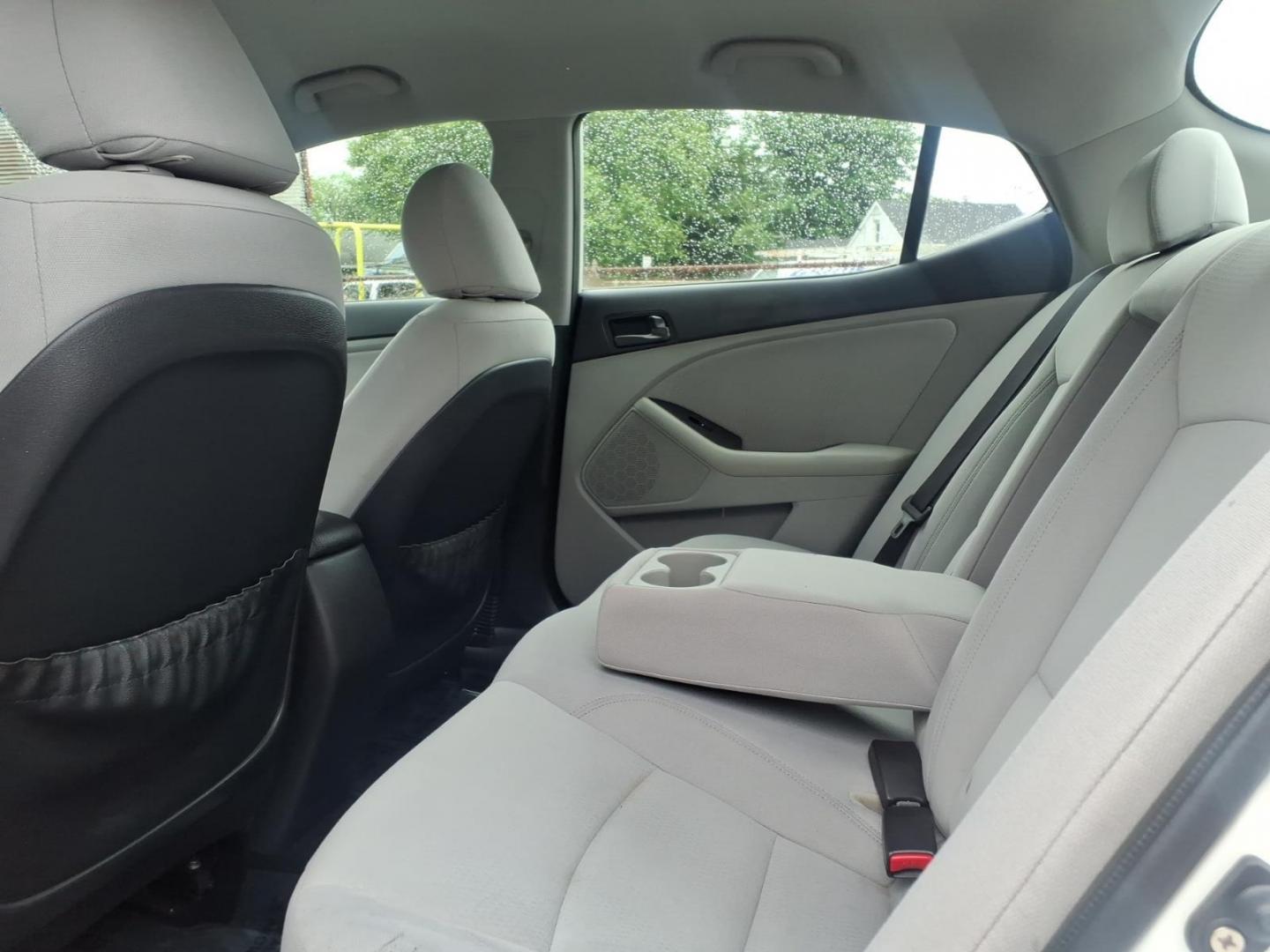 2015 White Kia Optima LX (KNAGM4A79F5) with an 2.4L 4 Cylinder Fuel Injected engine, Automatic transmission, located at 50 Eastern Blvd., Essex, MD, 21221, (410) 686-3444, 39.304367, -76.484947 - Photo#10