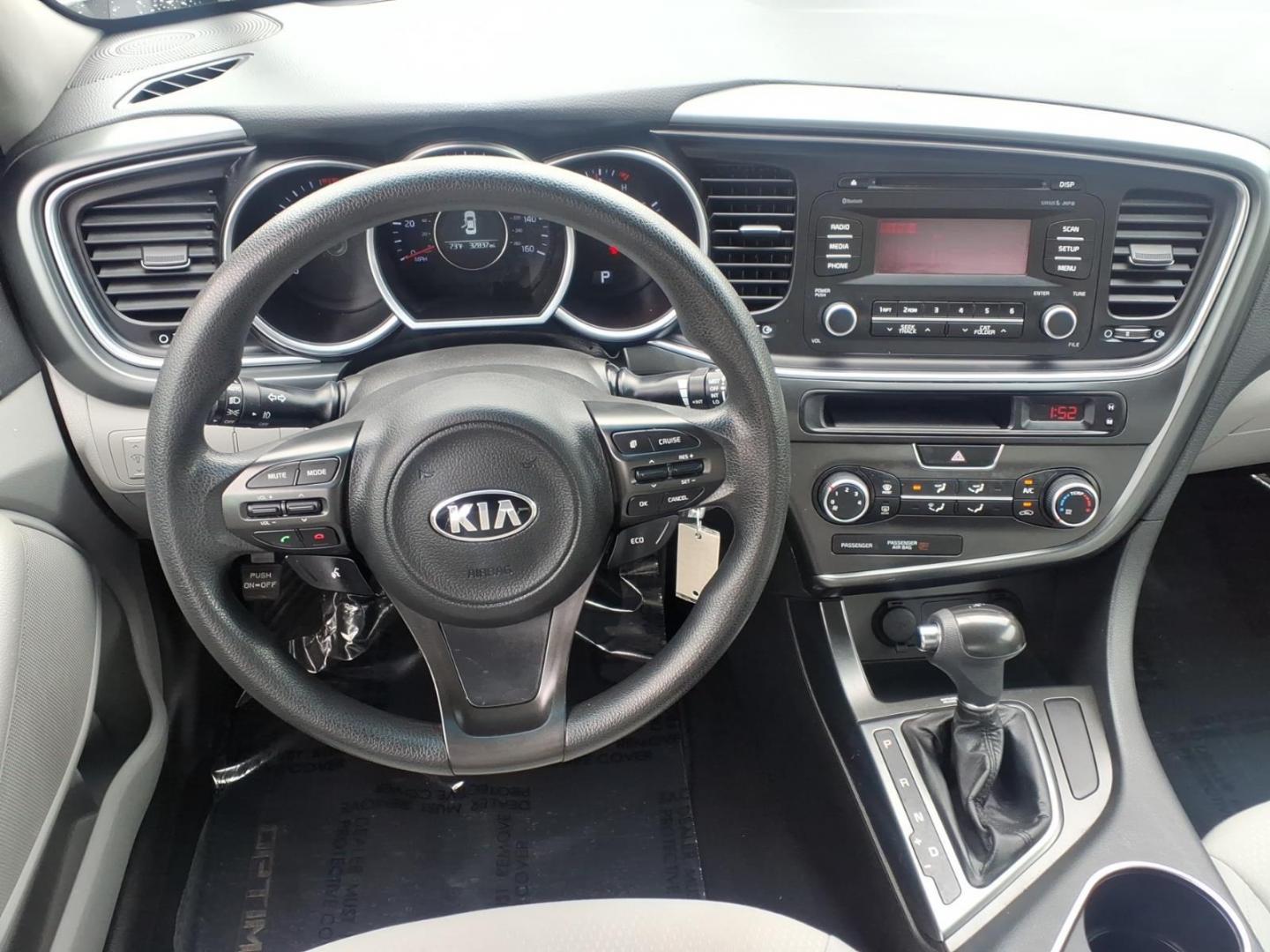 2015 White Kia Optima LX (KNAGM4A79F5) with an 2.4L 4 Cylinder Fuel Injected engine, Automatic transmission, located at 50 Eastern Blvd., Essex, MD, 21221, (410) 686-3444, 39.304367, -76.484947 - Photo#12