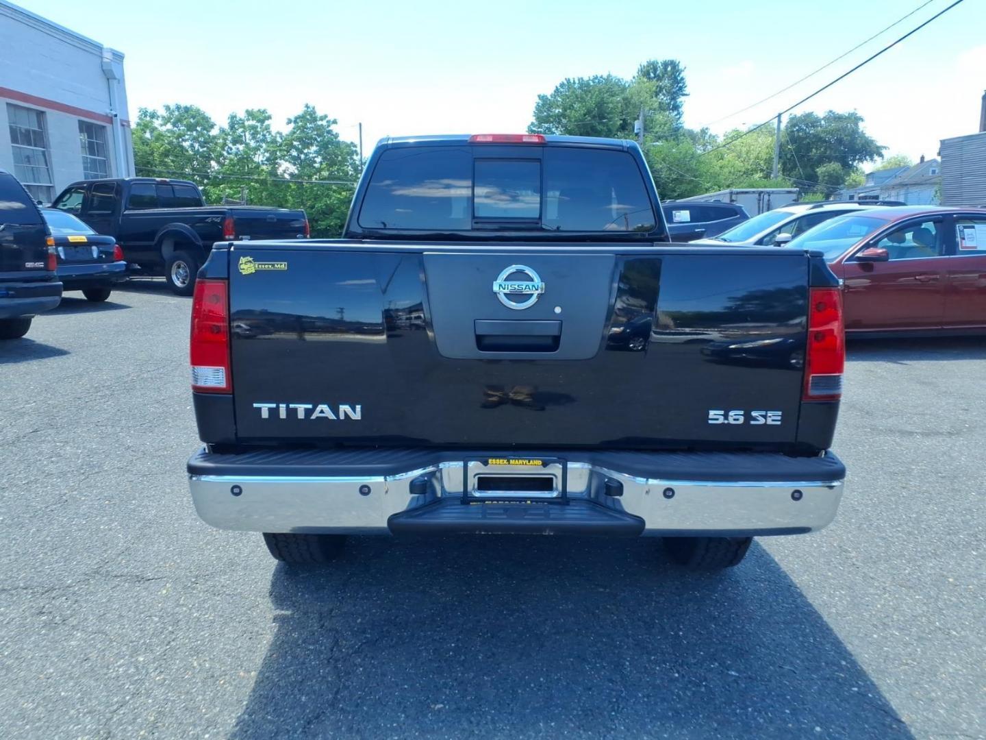 2006 Black Nissan Titan SE (1N6AA06B26N) with an 5.6L 5.6L V8 305hp 379ft. lbs. Fuel Injected engine, 5-Speed Shiftable Automatic transmission, located at 50 Eastern Blvd., Essex, MD, 21221, (410) 686-3444, 39.304367, -76.484947- Photo#3