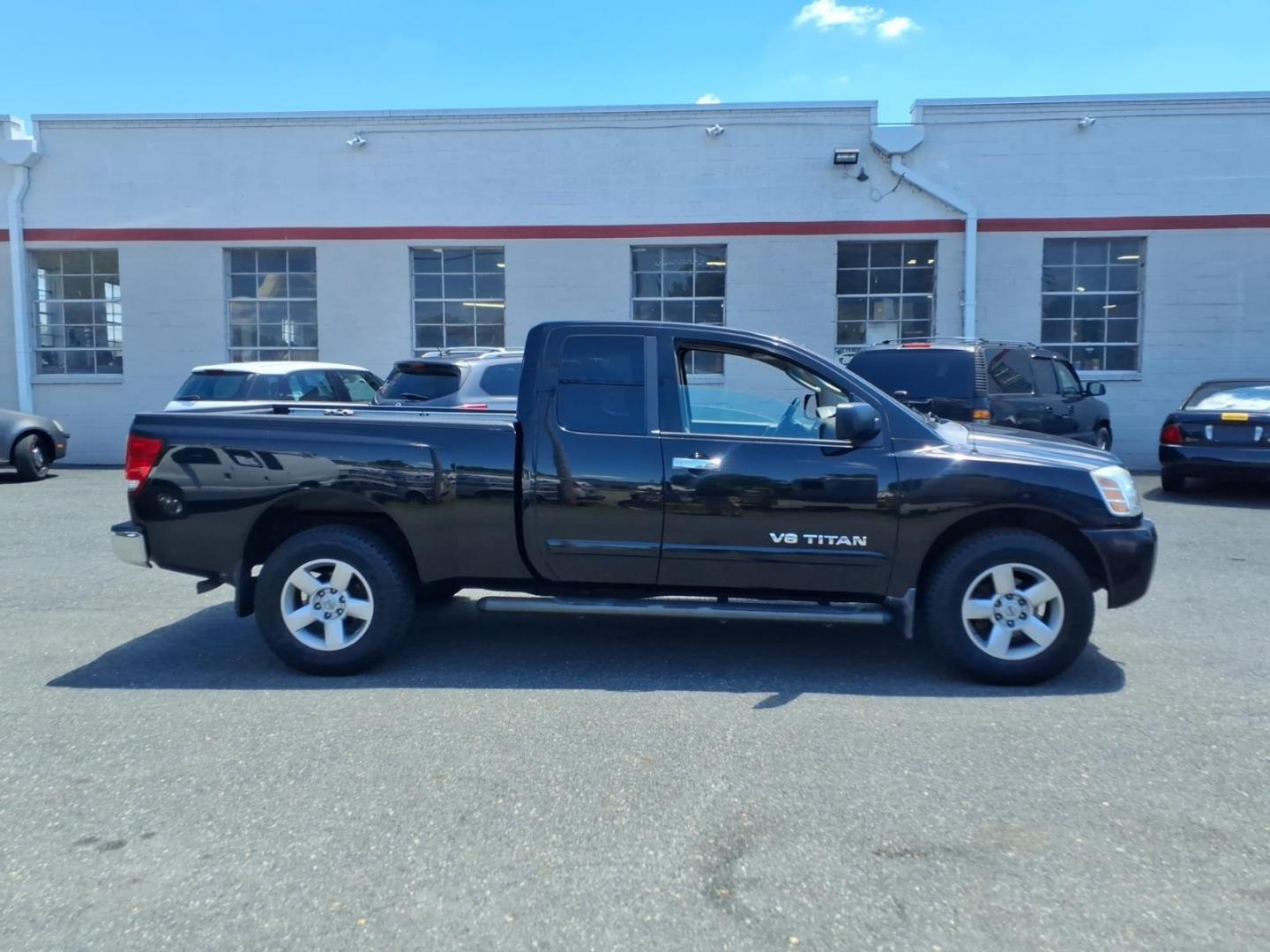 2006 Black Nissan Titan SE (1N6AA06B26N) with an 5.6L 5.6L V8 305hp 379ft. lbs. Fuel Injected engine, 5-Speed Shiftable Automatic transmission, located at 50 Eastern Blvd., Essex, MD, 21221, (410) 686-3444, 39.304367, -76.484947- Photo#5
