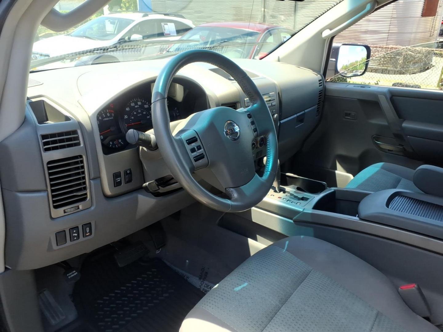 2006 Black Nissan Titan SE (1N6AA06B26N) with an 5.6L 5.6L V8 305hp 379ft. lbs. Fuel Injected engine, 5-Speed Shiftable Automatic transmission, located at 50 Eastern Blvd., Essex, MD, 21221, (410) 686-3444, 39.304367, -76.484947- Photo#7