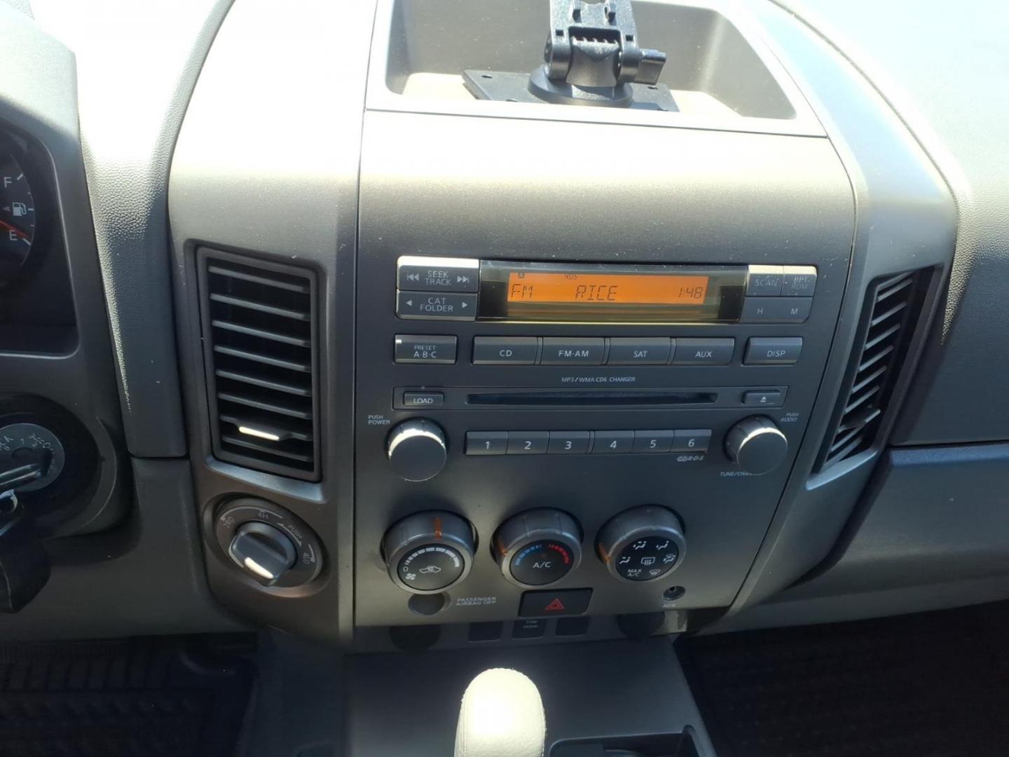 2006 Black Nissan Titan SE (1N6AA06B26N) with an 5.6L 5.6L V8 305hp 379ft. lbs. Fuel Injected engine, 5-Speed Shiftable Automatic transmission, located at 50 Eastern Blvd., Essex, MD, 21221, (410) 686-3444, 39.304367, -76.484947- Photo#13