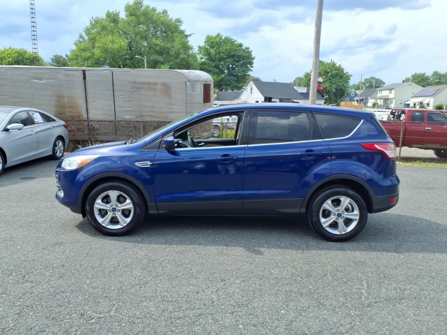 2014 Deep Impact Blue Metallic Ford Escape SE (1FMCU9G9XEU) with an 2.0L EcoBoost 2.0L Turbo I4 240hp 270ft. lbs. Turbocharged engine, 6-Speed Shiftable Automatic transmission, located at 50 Eastern Blvd., Essex, MD, 21221, (410) 686-3444, 39.304367, -76.484947 - Photo#1
