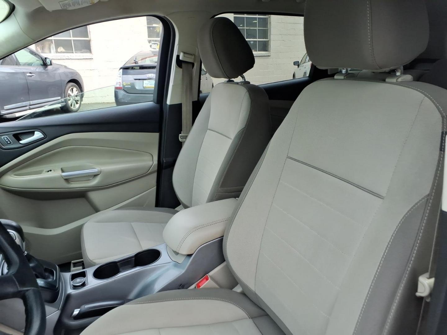 2014 Deep Impact Blue Metallic Ford Escape SE (1FMCU9G9XEU) with an 2.0L EcoBoost 2.0L Turbo I4 240hp 270ft. lbs. Turbocharged engine, 6-Speed Shiftable Automatic transmission, located at 50 Eastern Blvd., Essex, MD, 21221, (410) 686-3444, 39.304367, -76.484947 - Photo#8