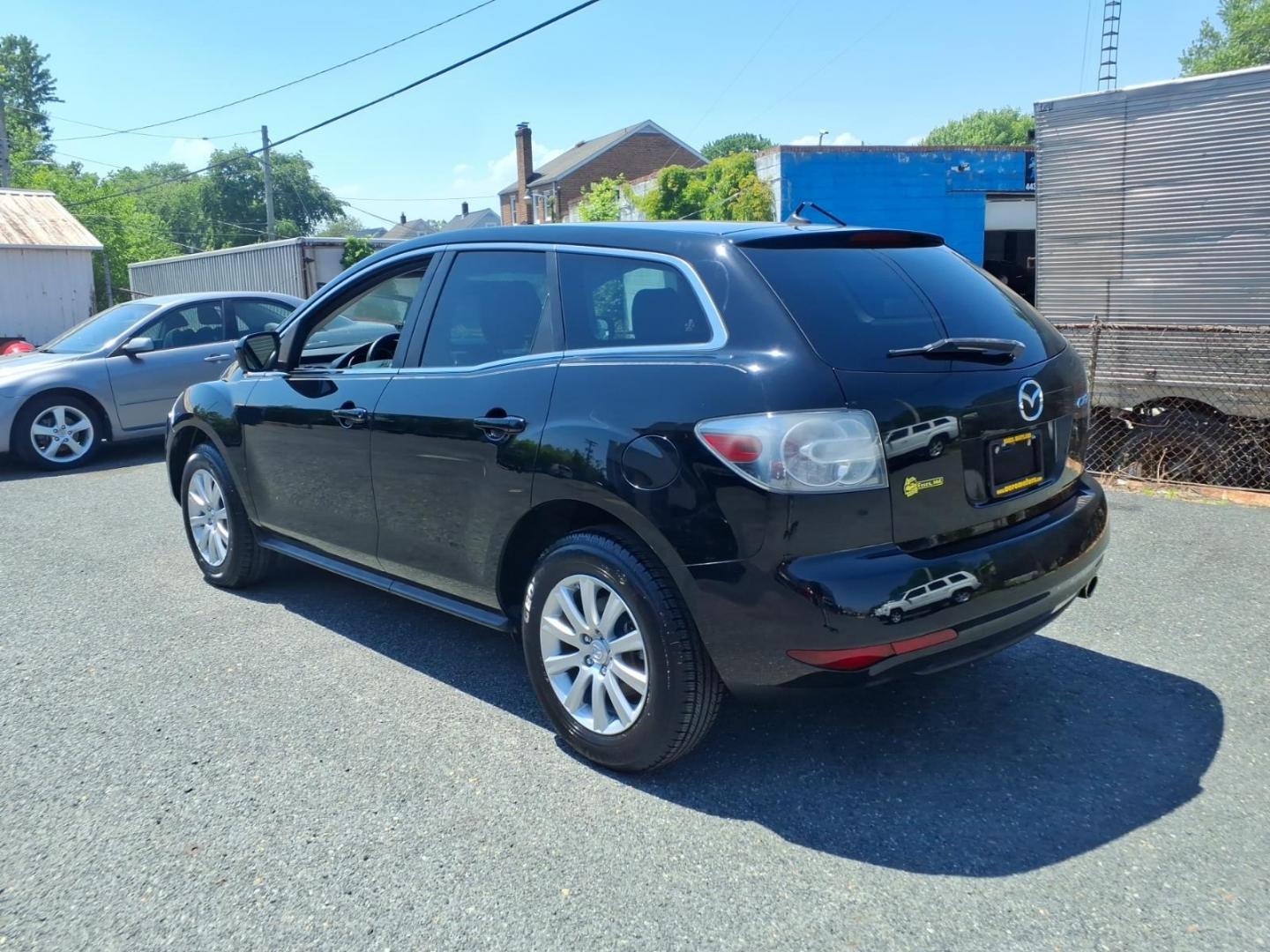 2011 Black Mazda CX-7 i Sport (JM3ER2BMXB0) with an 2.5L 4 Cylinder Fuel Injected engine, Automatic transmission, located at 50 Eastern Blvd., Essex, MD, 21221, (410) 686-3444, 39.304367, -76.484947 - Photo#2