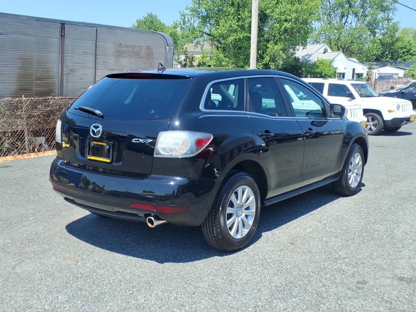 2011 Black Mazda CX-7 i Sport (JM3ER2BMXB0) with an 2.5L 4 Cylinder Fuel Injected engine, Automatic transmission, located at 50 Eastern Blvd., Essex, MD, 21221, (410) 686-3444, 39.304367, -76.484947 - Photo#4
