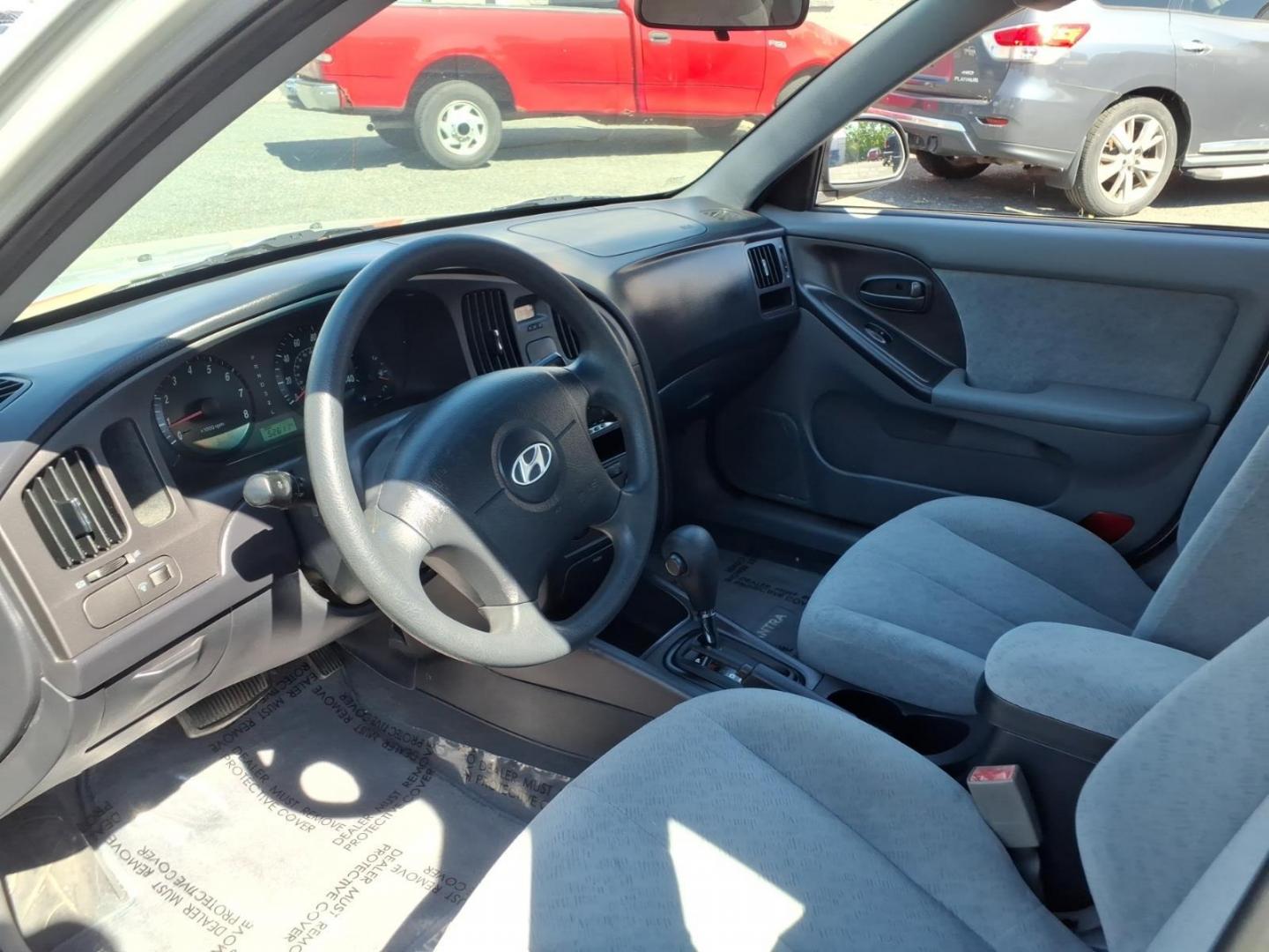 2004 Gray Hyundai ELANTRA (KMHDN46D34U) with an 2.0L 4 Cylinder Fuel Injected engine, Automatic transmission, located at 50 Eastern Blvd., Essex, MD, 21221, (410) 686-3444, 39.304367, -76.484947 - Photo#8
