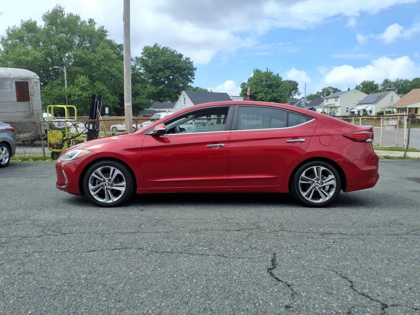 2017 Scarlet Red Hyundai ELANTRA Limited (5NPD84LF6HH) with an 2.0L 4 Cylinder Sequential-Port F.I. engine, 4CYL transmission, located at 50 Eastern Blvd., Essex, MD, 21221, (410) 686-3444, 39.304367, -76.484947 - Photo#1