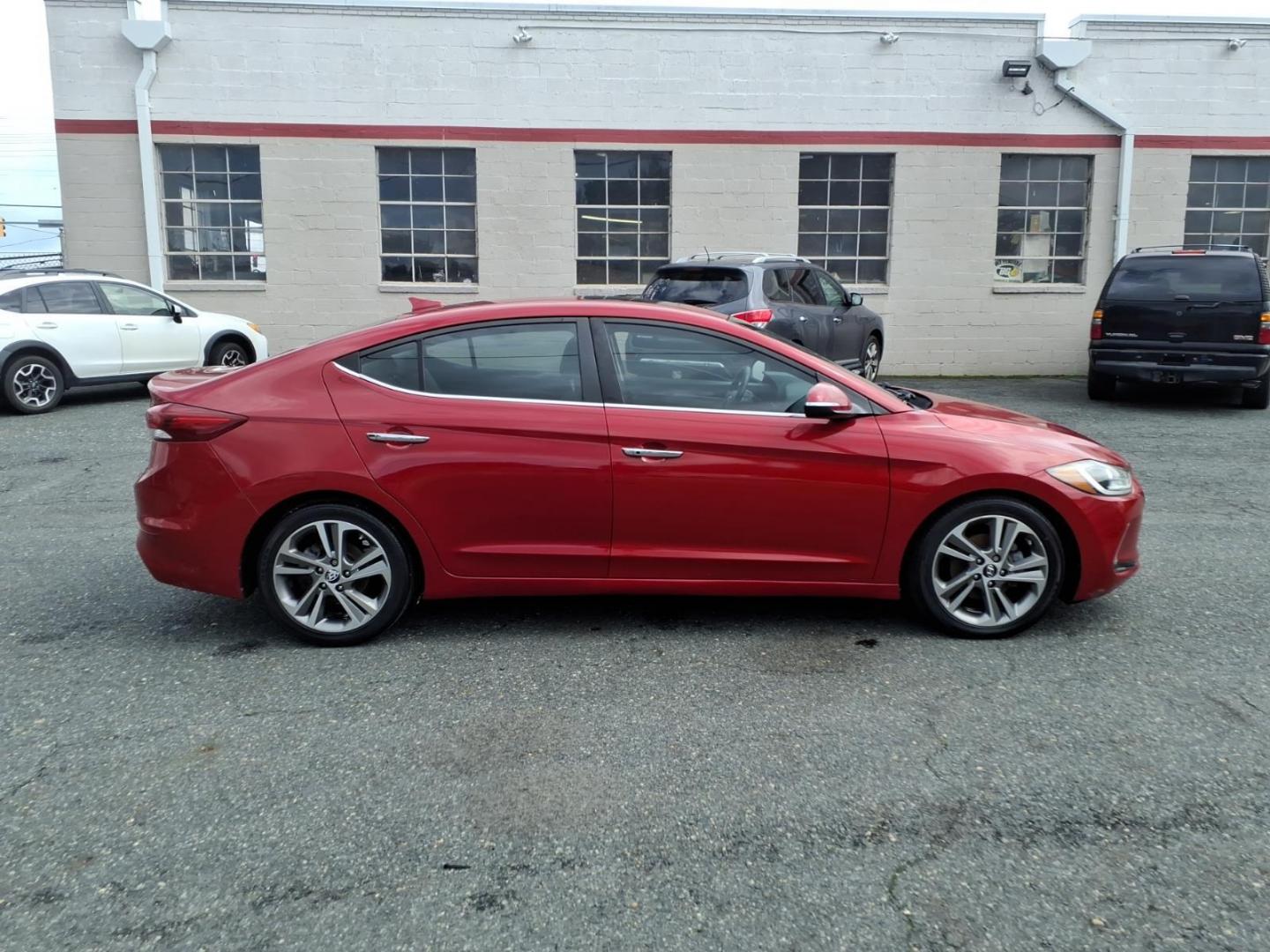 2017 Scarlet Red Hyundai ELANTRA Limited (5NPD84LF6HH) with an 2.0L 4 Cylinder Sequential-Port F.I. engine, 4CYL transmission, located at 50 Eastern Blvd., Essex, MD, 21221, (410) 686-3444, 39.304367, -76.484947 - Photo#4