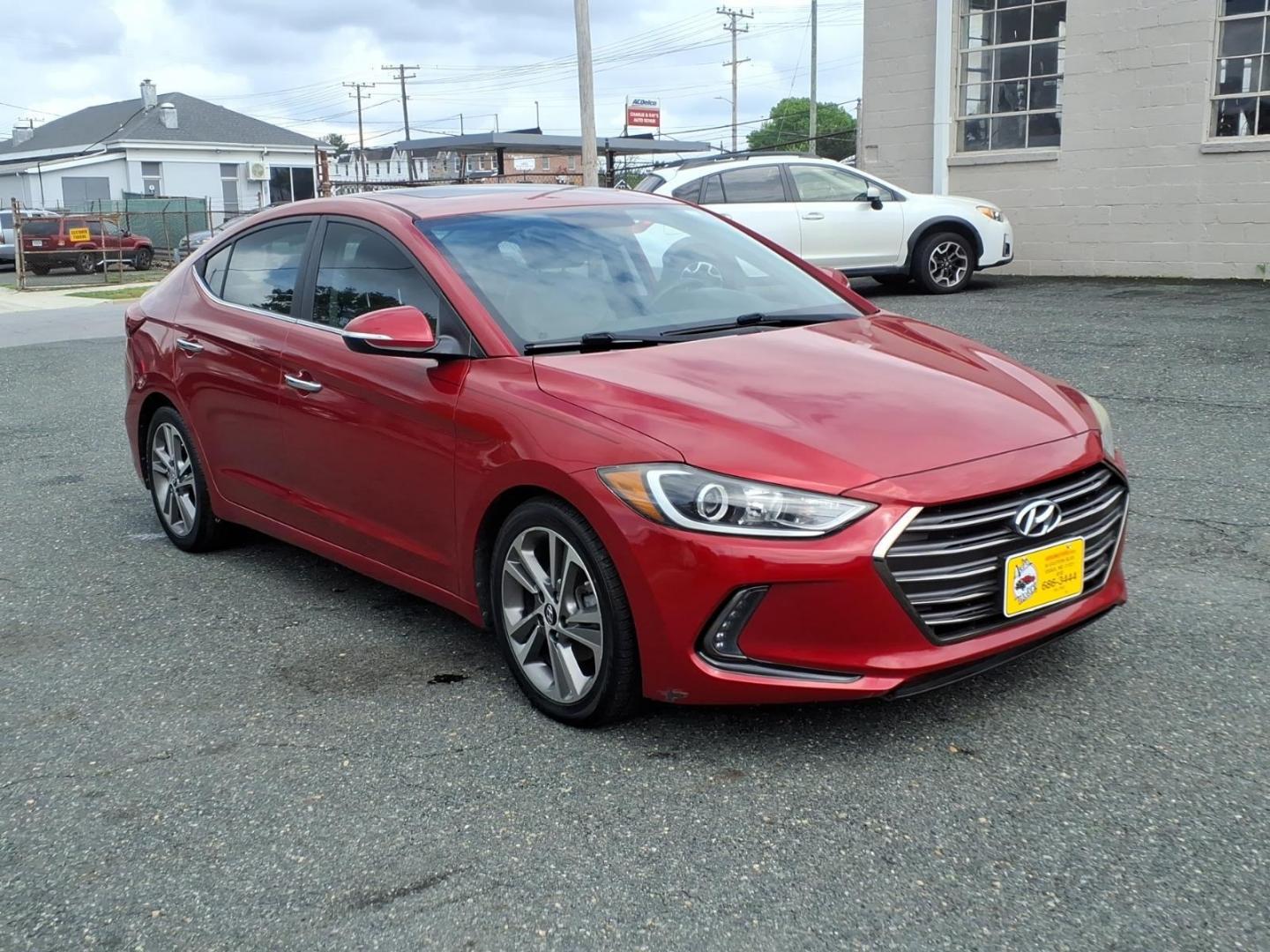 2017 Scarlet Red Hyundai ELANTRA Limited (5NPD84LF6HH) with an 2.0L 4 Cylinder Sequential-Port F.I. engine, 4CYL transmission, located at 50 Eastern Blvd., Essex, MD, 21221, (410) 686-3444, 39.304367, -76.484947 - Photo#5