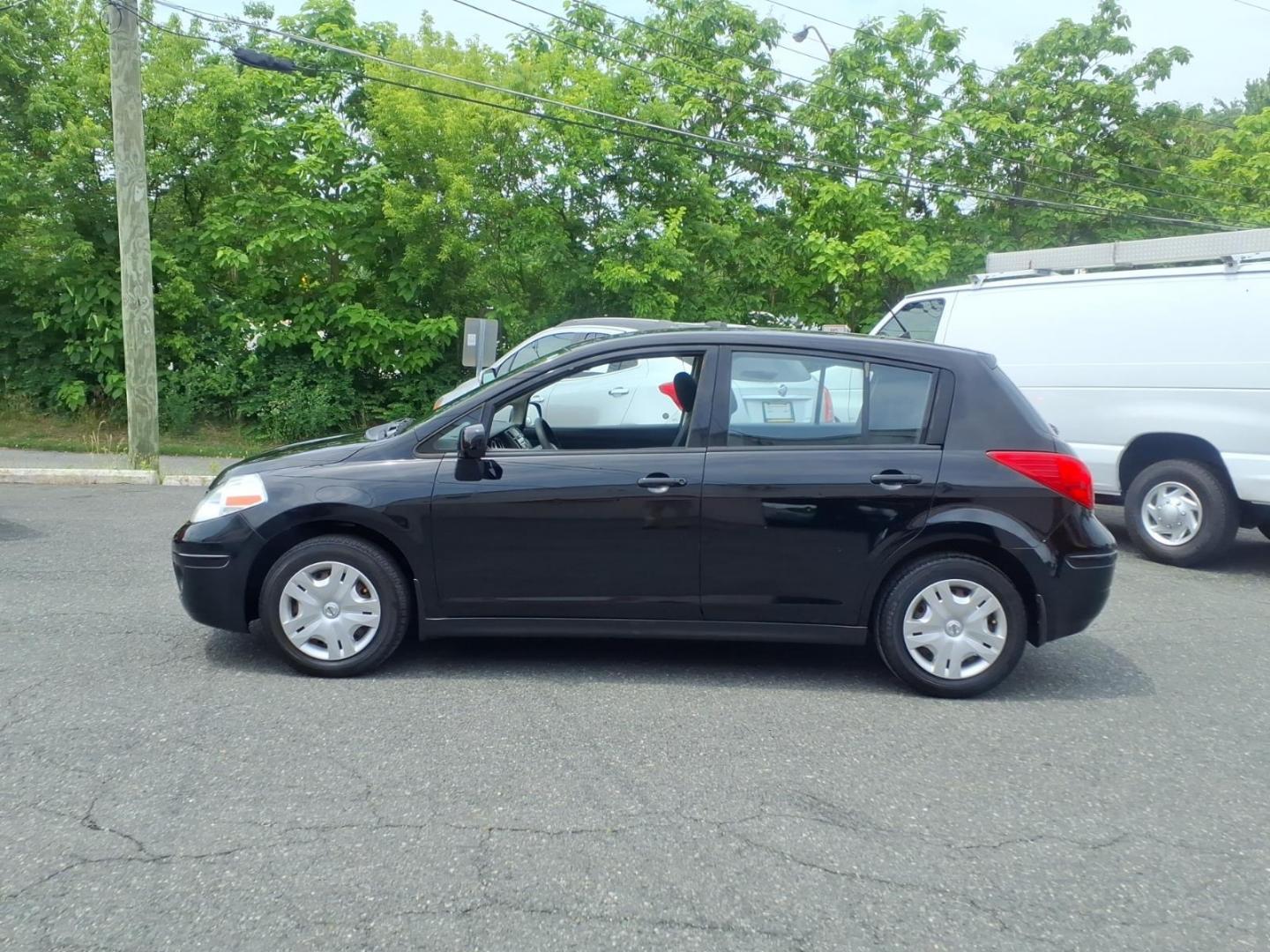 2010 Black Nissan Versa 1.8 S (3N1BC1CP2AL) with an 1.8L 1.8L I4 122hp 127ft. lbs. Sequential-Port F.I. engine, 4-Speed Automatic transmission, located at 50 Eastern Blvd., Essex, MD, 21221, (410) 686-3444, 39.304367, -76.484947 - Photo#1