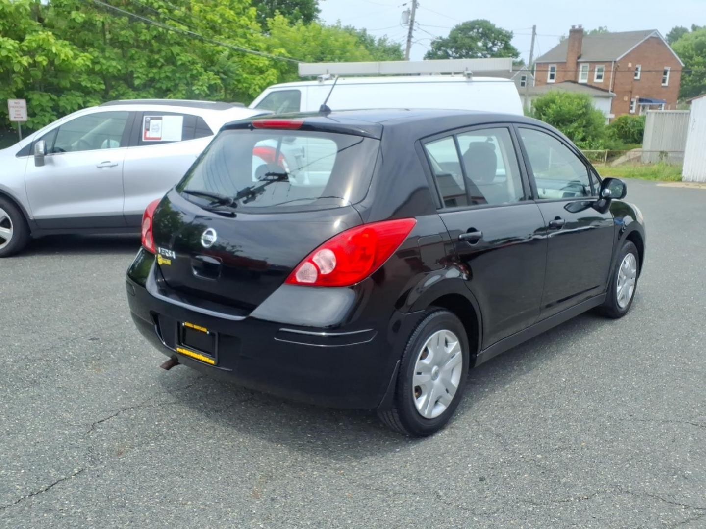 2010 Black Nissan Versa 1.8 S (3N1BC1CP2AL) with an 1.8L 1.8L I4 122hp 127ft. lbs. Sequential-Port F.I. engine, 4-Speed Automatic transmission, located at 50 Eastern Blvd., Essex, MD, 21221, (410) 686-3444, 39.304367, -76.484947 - Photo#4