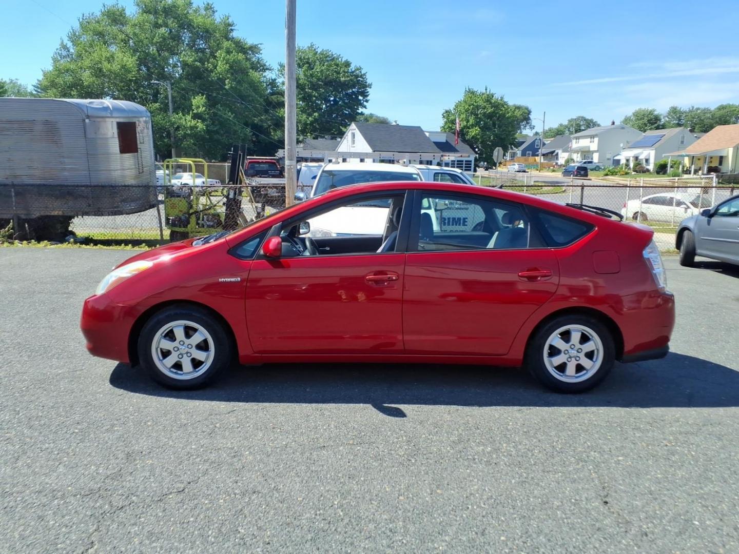 2007 Red Toyota Prius (JTDKB20U377) with an 1.5L 4 Cylinder Fuel Injected engine, Automatic transmission, located at 50 Eastern Blvd., Essex, MD, 21221, (410) 686-3444, 39.304367, -76.484947 - Photo#1