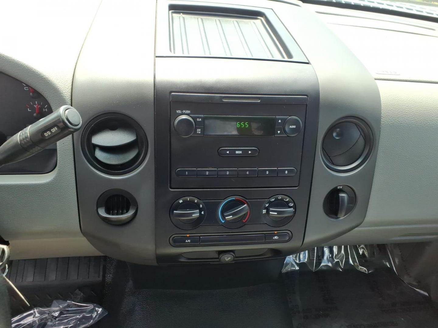 2005 White Ford F-150 XL (1FTRF12265N) with an 4.2L 4.2L V6 202hp 260ft. lb. Sequential-Port F.I. engine, 4-Speed Automatic transmission, located at 50 Eastern Blvd., Essex, MD, 21221, (410) 686-3444, 39.304367, -76.484947 - Photo#11