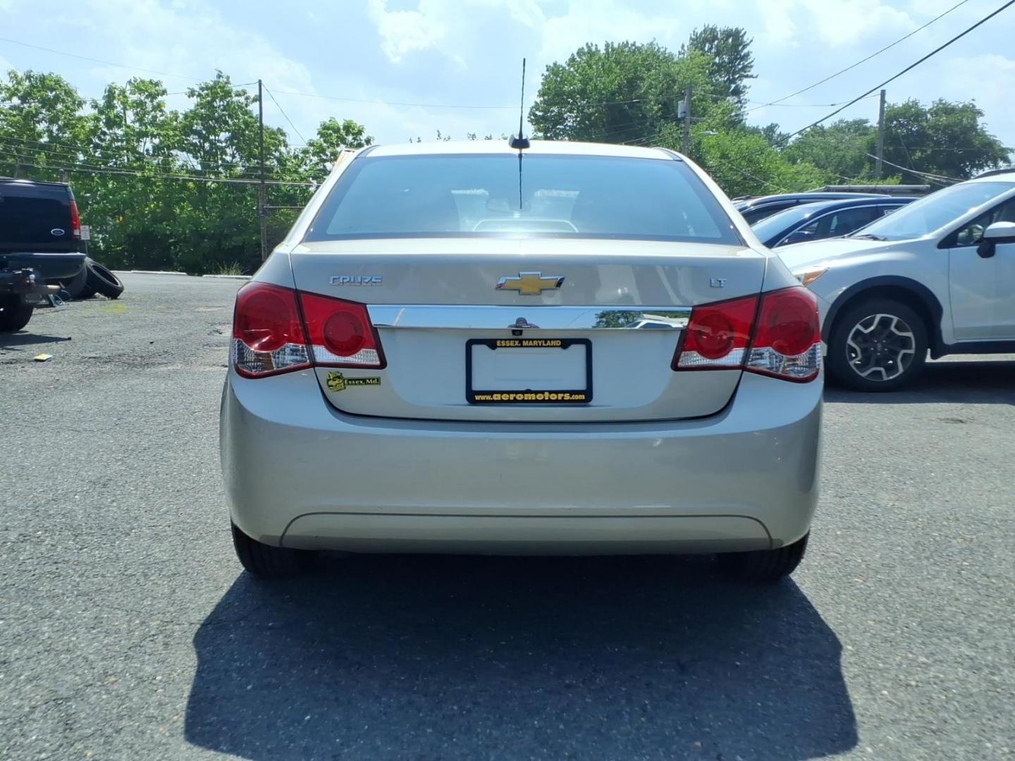 2015 Gold Chevrolet Cruze 1LT Auto (1G1PC5SB2F7) with an 1.4L 4 Cylinder Sequential-Port F.I. engine, Automatic transmission, located at 50 Eastern Blvd., Essex, MD, 21221, (410) 686-3444, 39.304367, -76.484947- Photo#3