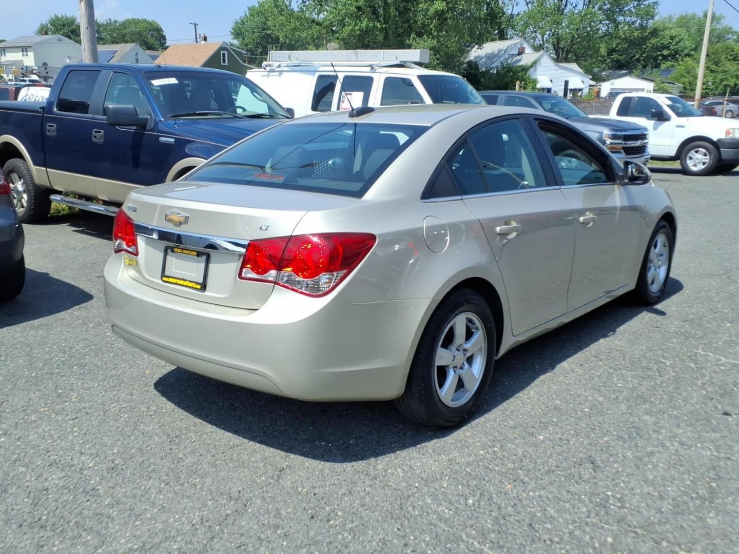 2015 Gold Chevrolet Cruze 1LT Auto (1G1PC5SB2F7) with an 1.4L 4 Cylinder Sequential-Port F.I. engine, Automatic transmission, located at 50 Eastern Blvd., Essex, MD, 21221, (410) 686-3444, 39.304367, -76.484947- Photo#4