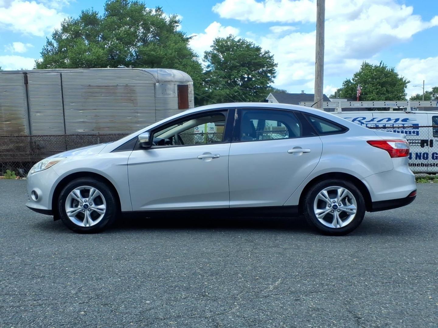 2013 Silver Ford Focus SE (1FADP3F28DL) with an 2.0L 4 Cylinder Fuel Injected engine, Automatic transmission, located at 50 Eastern Blvd., Essex, MD, 21221, (410) 686-3444, 39.304367, -76.484947- Photo#1