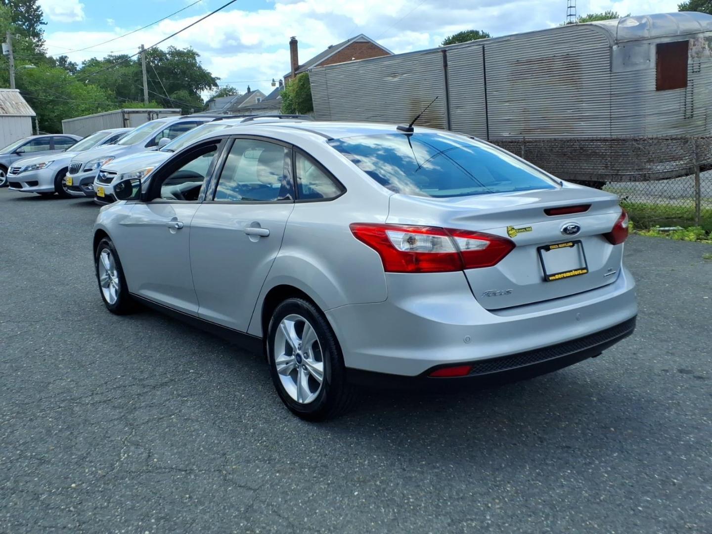 2013 Silver Ford Focus SE (1FADP3F28DL) with an 2.0L 4 Cylinder Fuel Injected engine, Automatic transmission, located at 50 Eastern Blvd., Essex, MD, 21221, (410) 686-3444, 39.304367, -76.484947- Photo#2