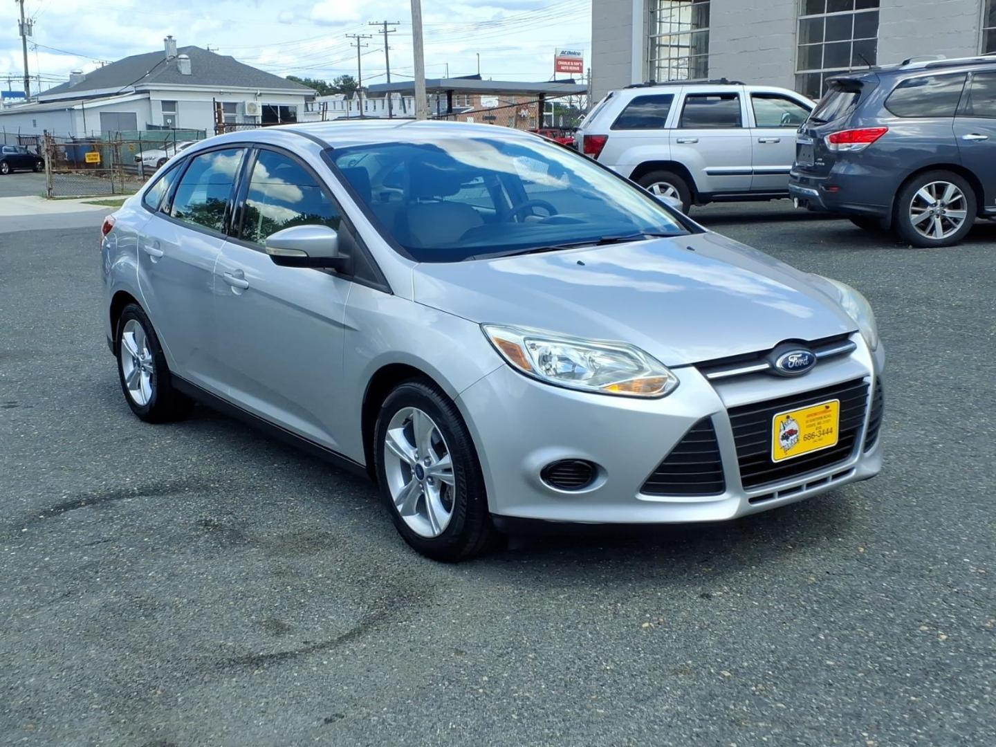 2013 Silver Ford Focus SE (1FADP3F28DL) with an 2.0L 4 Cylinder Fuel Injected engine, Automatic transmission, located at 50 Eastern Blvd., Essex, MD, 21221, (410) 686-3444, 39.304367, -76.484947- Photo#6