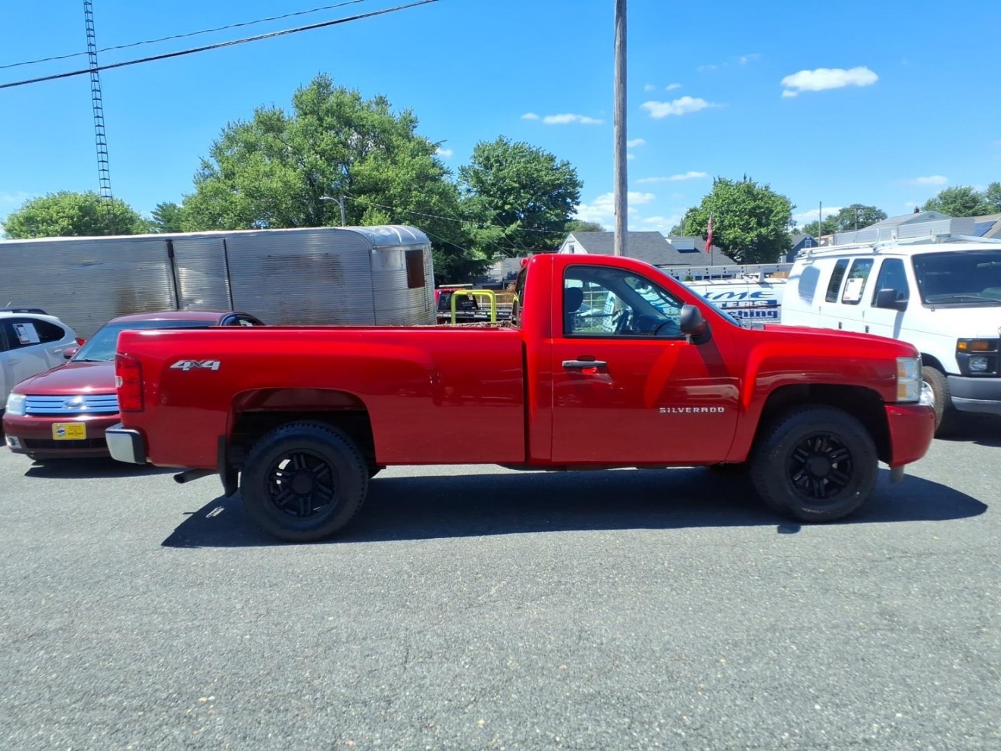 2011 Red Chevrolet Silverado 1500 LS (1GCNKPE04BZ) with an 5.3L 8 Cylinder Sequential-Port F.I. engine, Automatic transmission, located at 50 Eastern Blvd., Essex, MD, 21221, (410) 686-3444, 39.304367, -76.484947- Photo#1