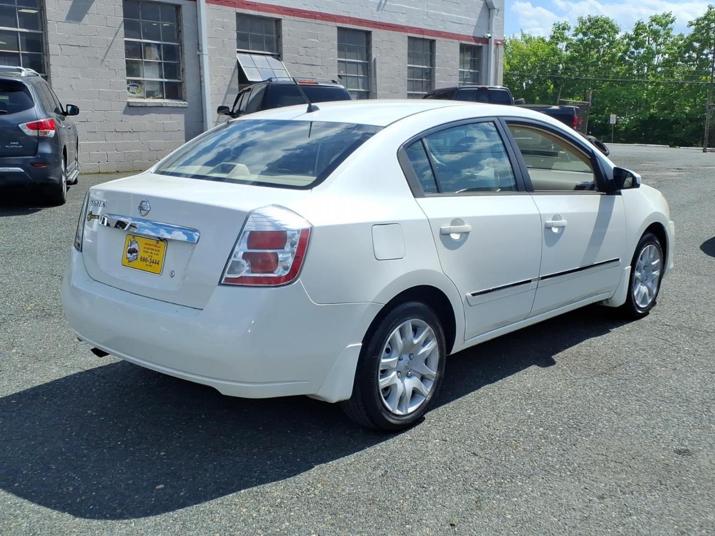 2010 White Nissan Sentra 2.0 (3N1AB6AP6AL) with an 2.0L 2.0L I4 140hp 147ft. lbs. Sequential-Port F.I. engine, CVT transmission, located at 50 Eastern Blvd., Essex, MD, 21221, (410) 686-3444, 39.304367, -76.484947- Photo#3