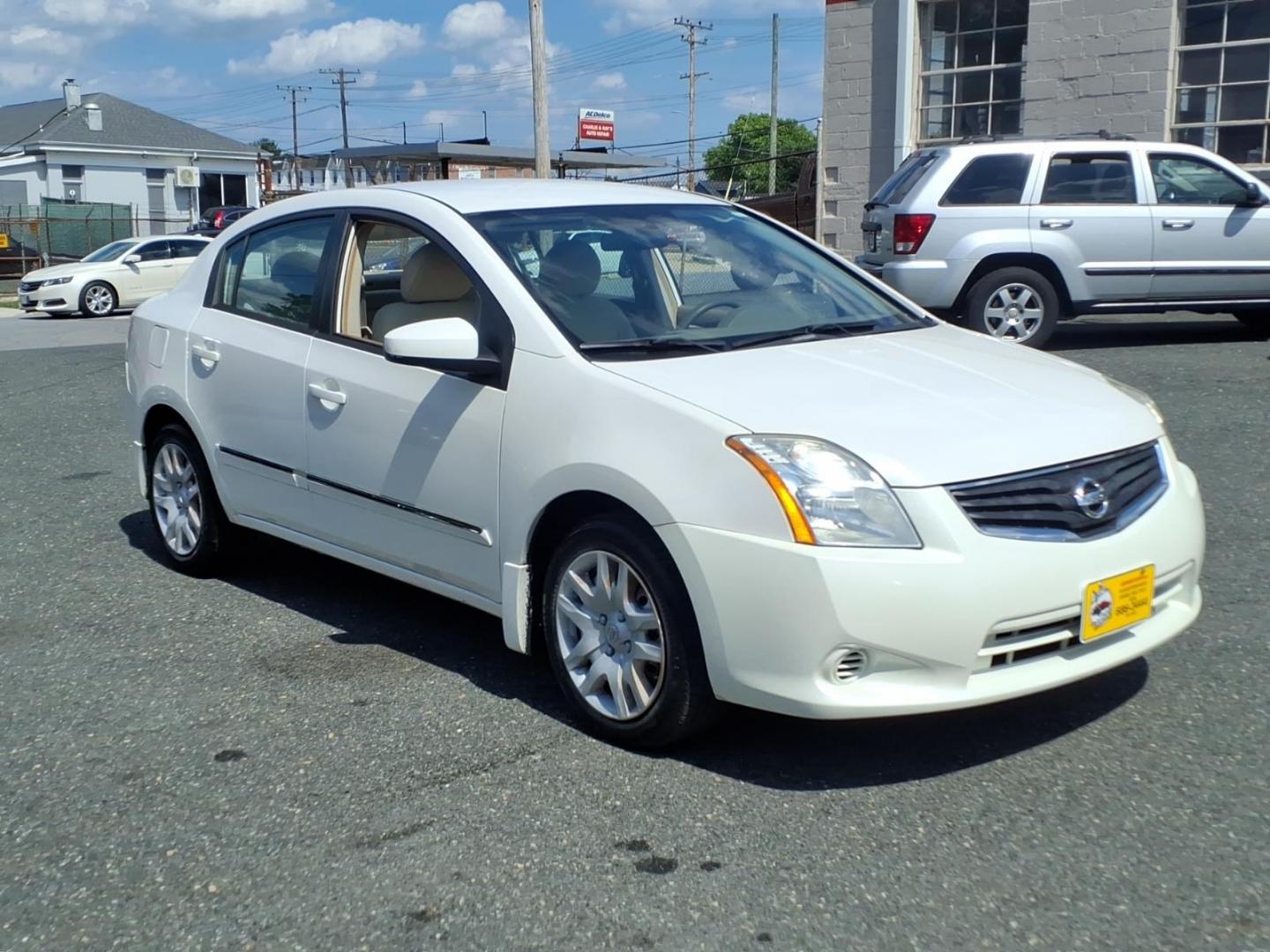 2010 White Nissan Sentra 2.0 (3N1AB6AP6AL) with an 2.0L 2.0L I4 140hp 147ft. lbs. Sequential-Port F.I. engine, CVT transmission, located at 50 Eastern Blvd., Essex, MD, 21221, (410) 686-3444, 39.304367, -76.484947- Photo#5