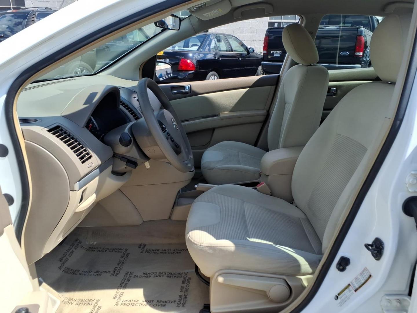 2010 White Nissan Sentra 2.0 (3N1AB6AP6AL) with an 2.0L 2.0L I4 140hp 147ft. lbs. Sequential-Port F.I. engine, CVT transmission, located at 50 Eastern Blvd., Essex, MD, 21221, (410) 686-3444, 39.304367, -76.484947- Photo#6