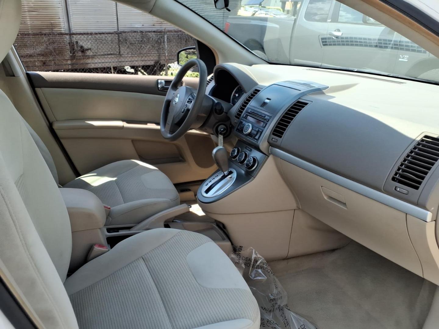 2010 White Nissan Sentra 2.0 (3N1AB6AP6AL) with an 2.0L 2.0L I4 140hp 147ft. lbs. Sequential-Port F.I. engine, CVT transmission, located at 50 Eastern Blvd., Essex, MD, 21221, (410) 686-3444, 39.304367, -76.484947- Photo#10
