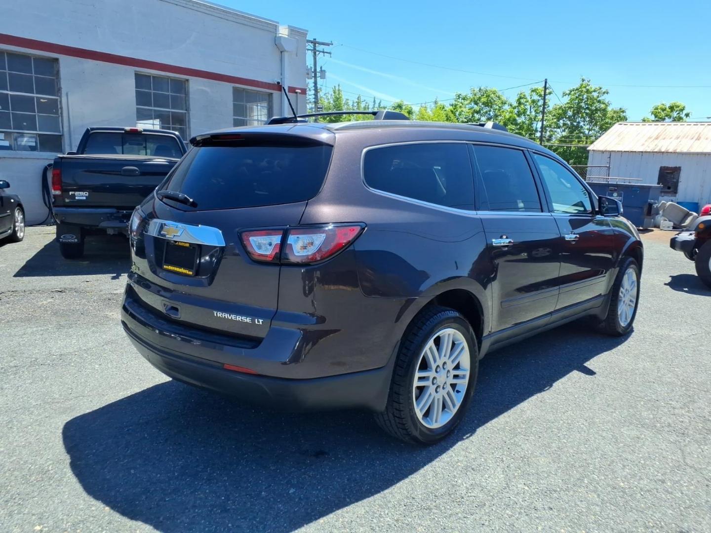 2015 Purple Chevrolet Traverse LT (1GNKVGKD2FJ) with an 3.6L 6 Cylinder Fuel Injected engine, V6 transmission, located at 50 Eastern Blvd., Essex, MD, 21221, (410) 686-3444, 39.304367, -76.484947- Photo#3