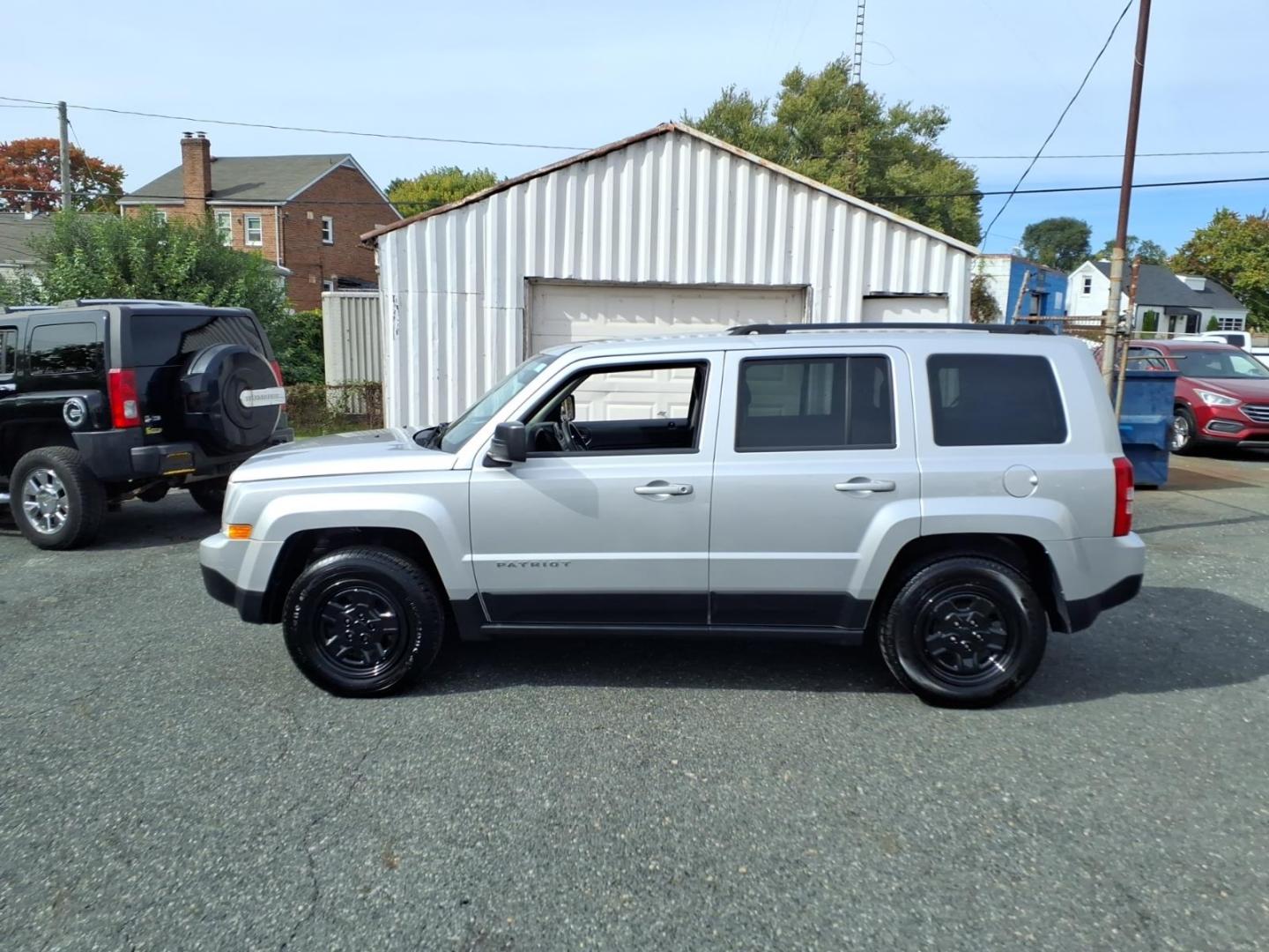 2014 Billet Silver Metallic Clear Coat Jeep Patriot Sport (1C4NJPBAXED) with an 2.0L 2.0L I4 158hp 141ft. lbs. Sequential-Port F.I. engine, Automatic transmission, located at 50 Eastern Blvd., Essex, MD, 21221, (410) 686-3444, 39.304367, -76.484947- Photo#1