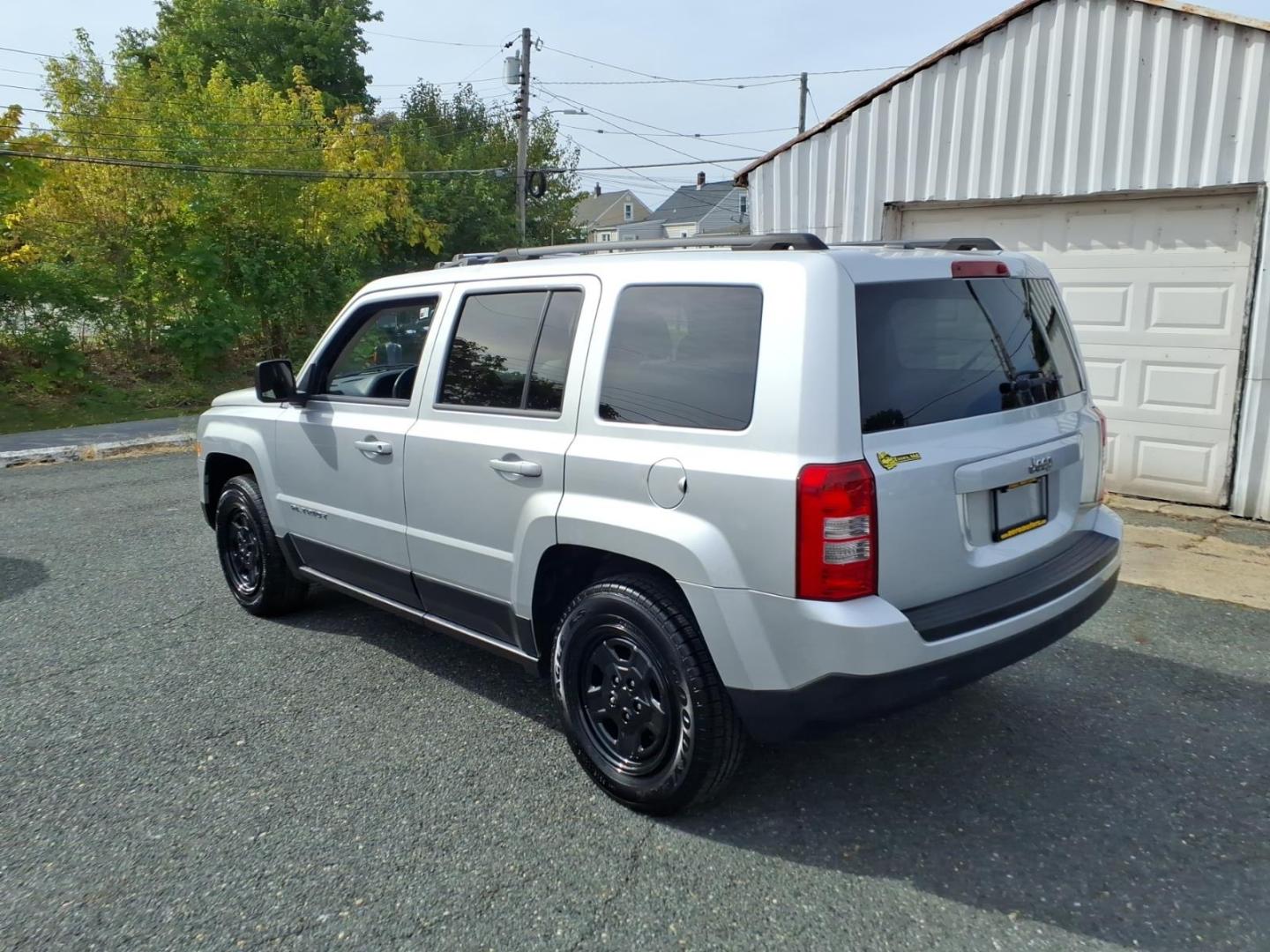 2014 Billet Silver Metallic Clear Coat Jeep Patriot Sport (1C4NJPBAXED) with an 2.0L 2.0L I4 158hp 141ft. lbs. Sequential-Port F.I. engine, Automatic transmission, located at 50 Eastern Blvd., Essex, MD, 21221, (410) 686-3444, 39.304367, -76.484947- Photo#2