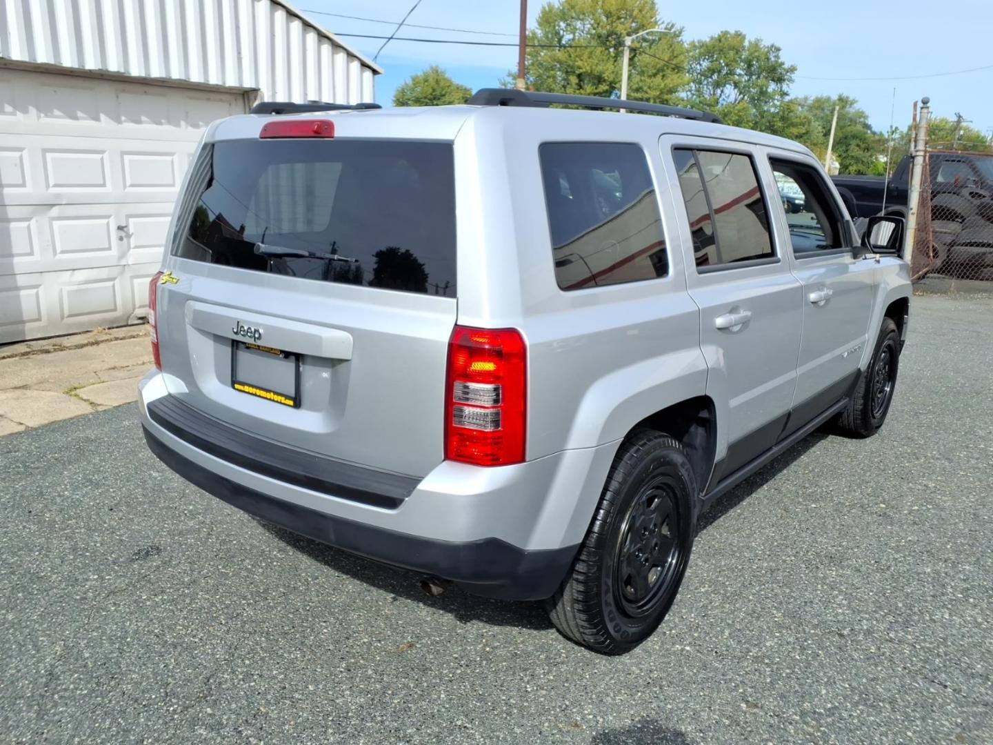 2014 Billet Silver Metallic Clear Coat Jeep Patriot Sport (1C4NJPBAXED) with an 2.0L 2.0L I4 158hp 141ft. lbs. Sequential-Port F.I. engine, Automatic transmission, located at 50 Eastern Blvd., Essex, MD, 21221, (410) 686-3444, 39.304367, -76.484947- Photo#3