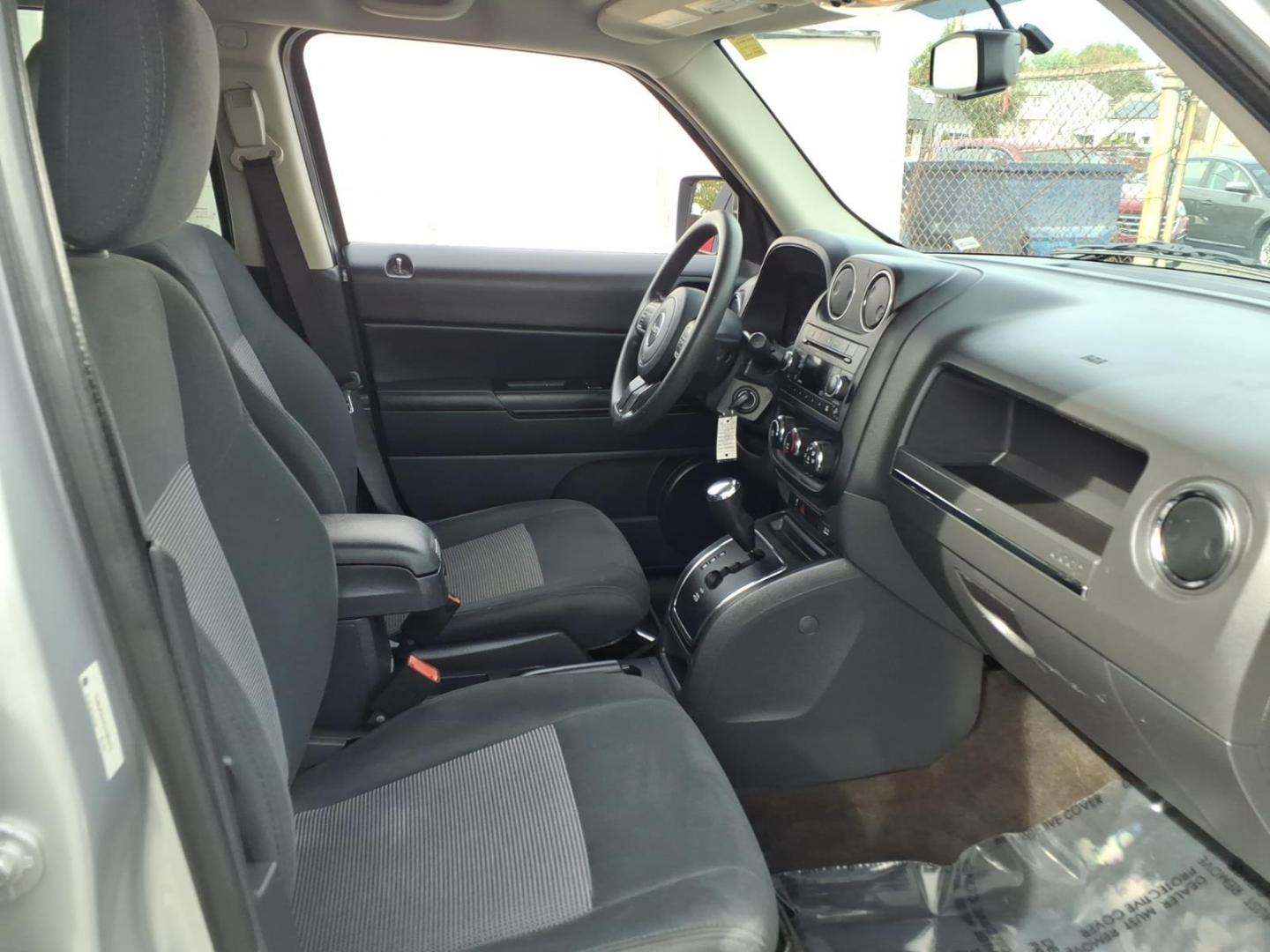2014 Billet Silver Metallic Clear Coat Jeep Patriot Sport (1C4NJPBAXED) with an 2.0L 2.0L I4 158hp 141ft. lbs. Sequential-Port F.I. engine, Automatic transmission, located at 50 Eastern Blvd., Essex, MD, 21221, (410) 686-3444, 39.304367, -76.484947- Photo#12