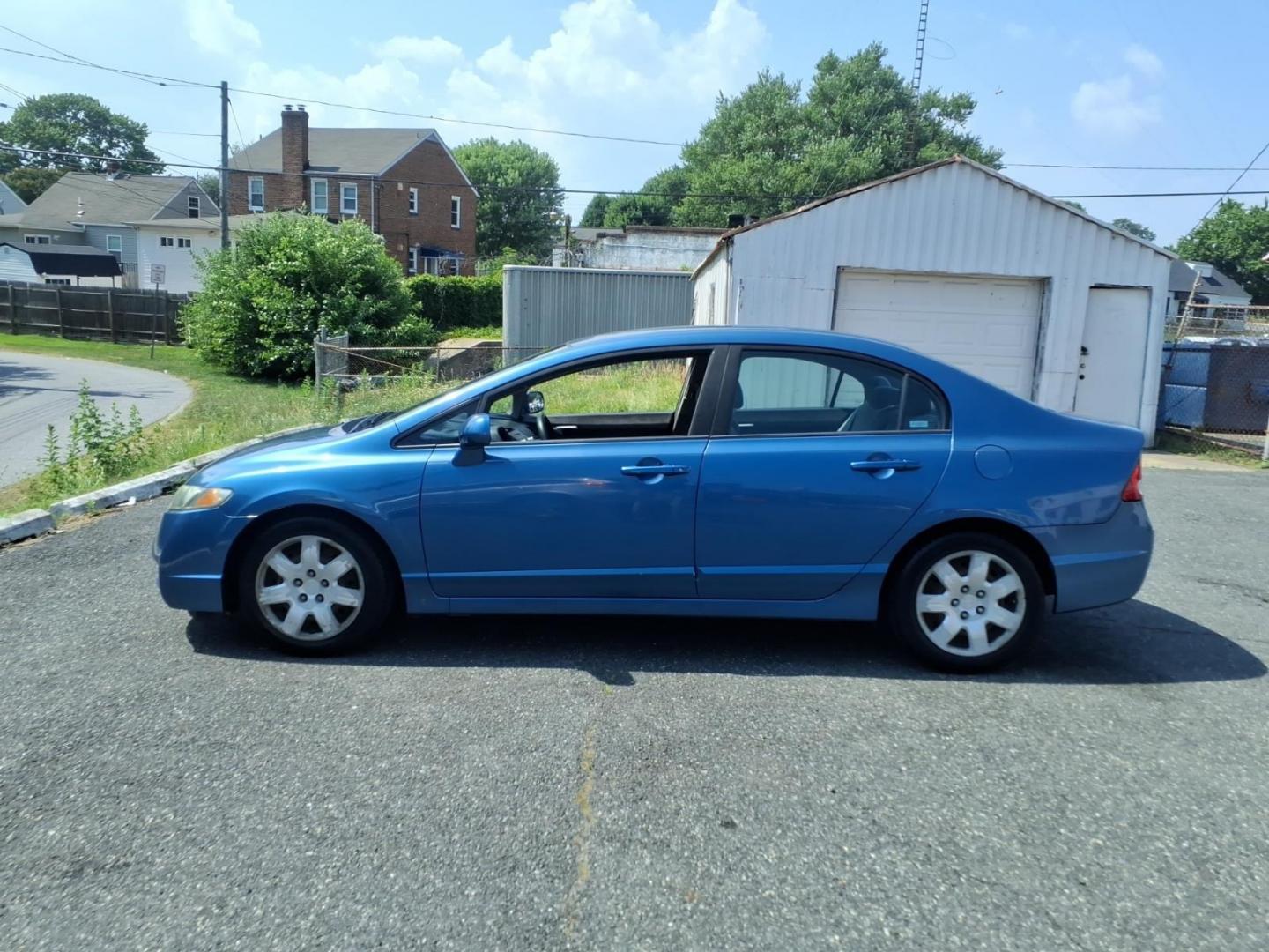 2009 Blue Honda Civic LX (1HGFA16569L) with an 1.8L 4 Cylinder Fuel Injected engine, Automatic transmission, located at 50 Eastern Blvd., Essex, MD, 21221, (410) 686-3444, 39.304367, -76.484947- Photo#1