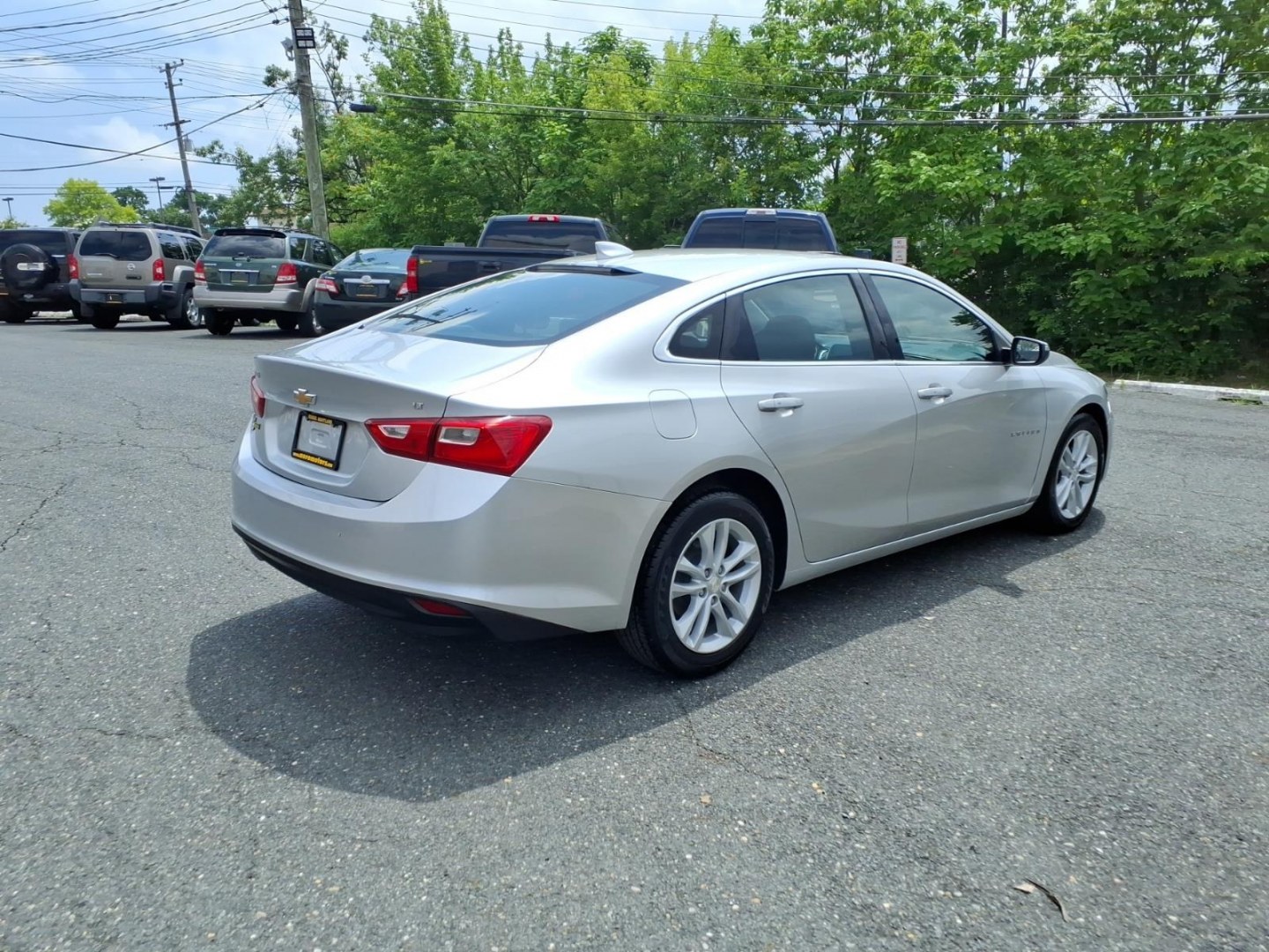 2016 Silver Chevrolet Malibu LT (1G1ZE5ST0GF) with an 1.5L 4 Cylinder Turbocharged engine, 6-Speed Shiftable Automatic transmission, located at 50 Eastern Blvd., Essex, MD, 21221, (410) 686-3444, 39.304367, -76.484947- Photo#4