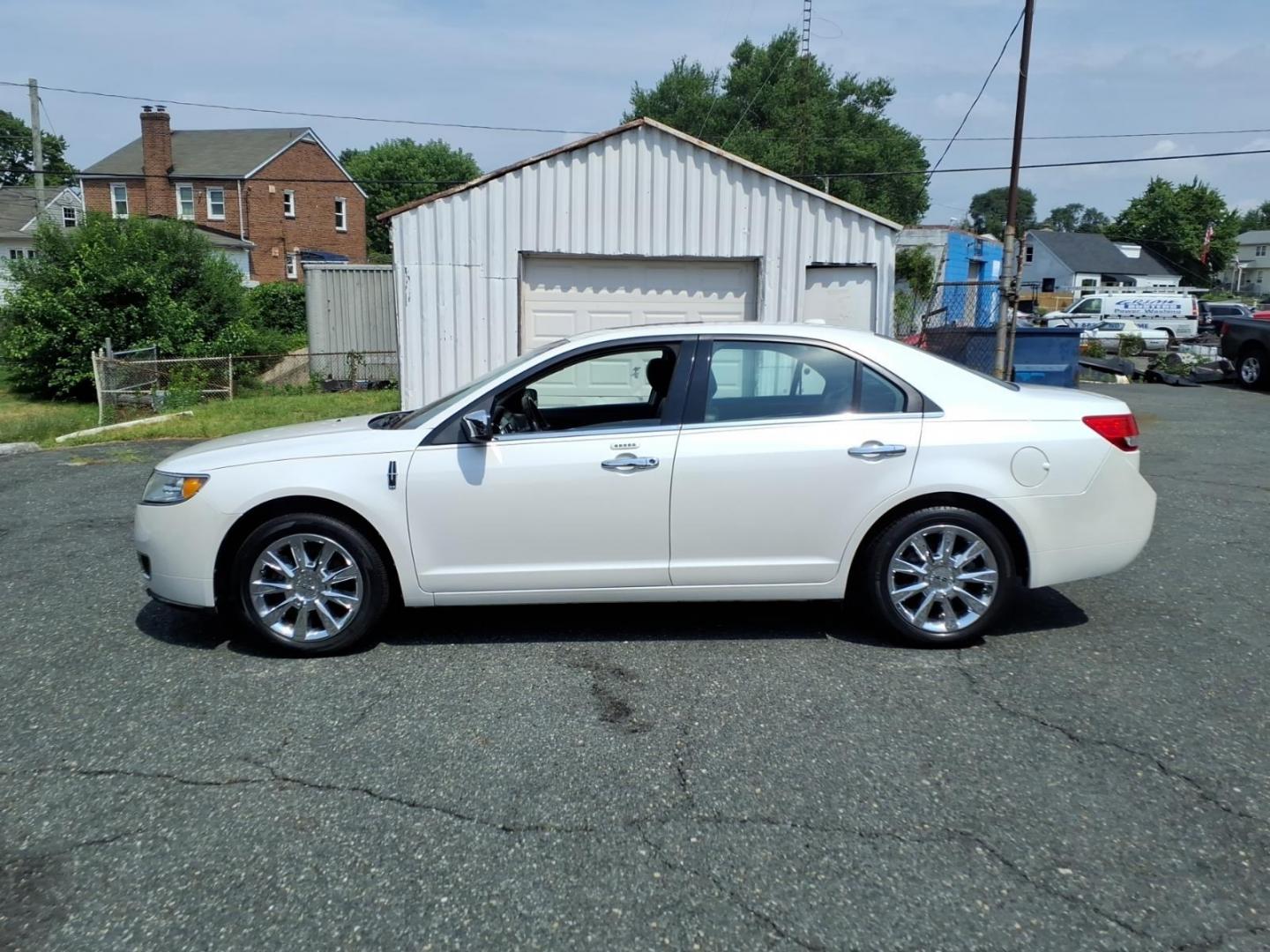 2011 White Lincoln MKZ Base (3LNHL2JC8BR) with an 3.5L 6 Cylinder Sequential-Port F.I. engine, Automatic transmission, located at 50 Eastern Blvd., Essex, MD, 21221, (410) 686-3444, 39.304367, -76.484947- Photo#1