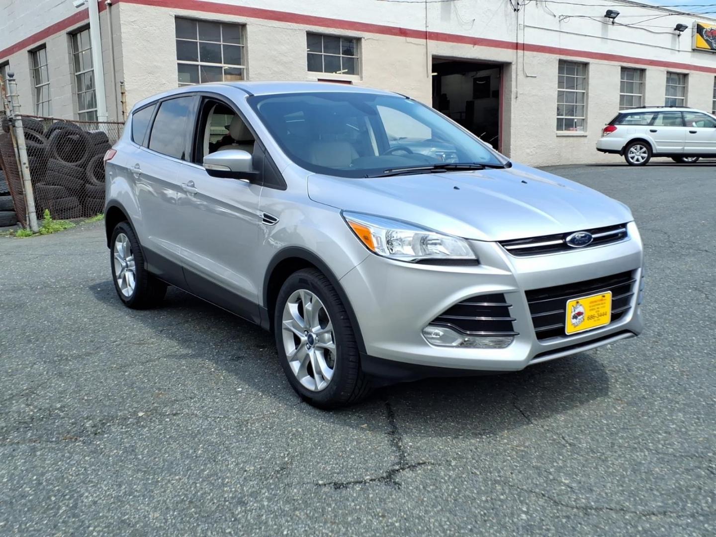 2013 Silver Ford Escape SEL (1FMCU0HX3DU) with an 1.6L 4 Cylinder Turbocharged engine, Automatic transmission, located at 50 Eastern Blvd., Essex, MD, 21221, (410) 686-3444, 39.304367, -76.484947- Photo#6