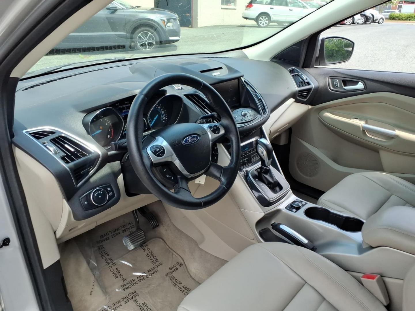 2013 Silver Ford Escape SEL (1FMCU0HX3DU) with an 1.6L 4 Cylinder Turbocharged engine, Automatic transmission, located at 50 Eastern Blvd., Essex, MD, 21221, (410) 686-3444, 39.304367, -76.484947- Photo#8