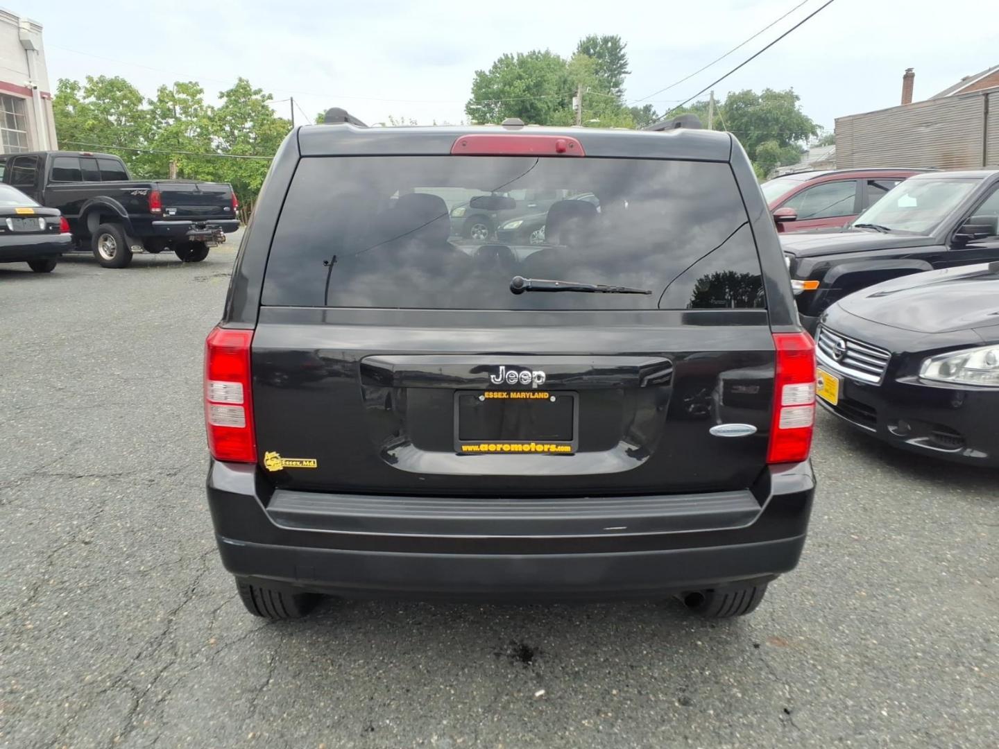 2011 Brilliant Black Crystal Pearl Coat Jeep Patriot Latitude (1J4NT1GA6BD) with an 2.0L 2.0L I4 158hp 141ft. lbs. Sequential-Port F.I. engine, Automatic transmission, located at 50 Eastern Blvd., Essex, MD, 21221, (410) 686-3444, 39.304367, -76.484947- Photo#3