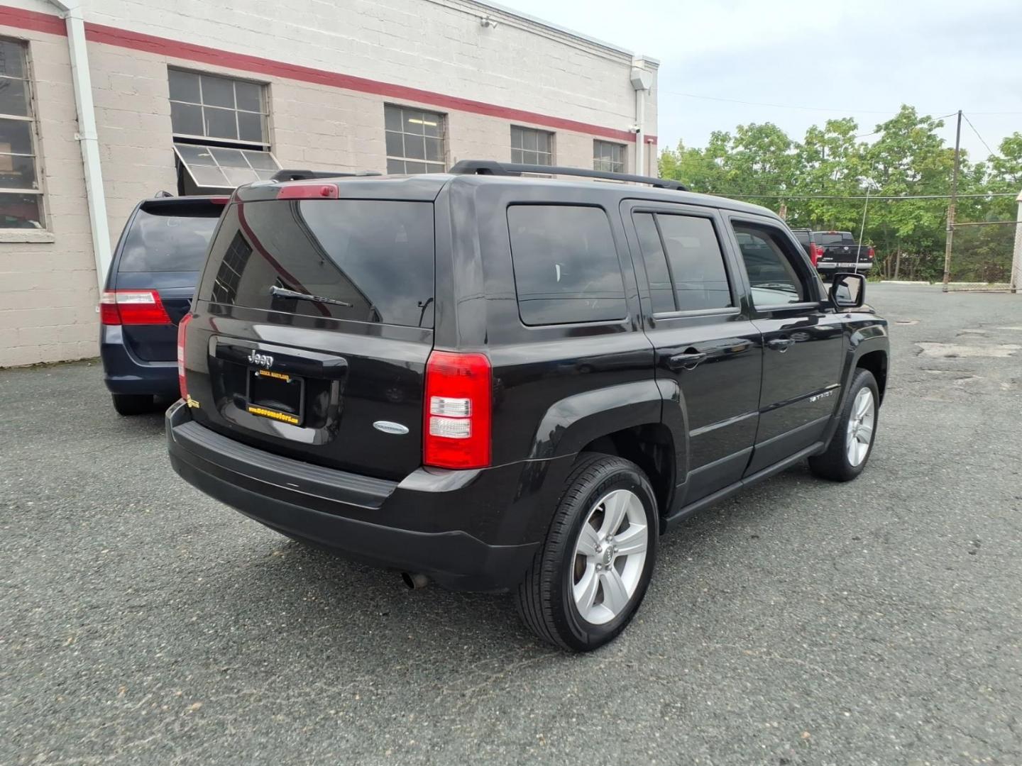 2011 Brilliant Black Crystal Pearl Coat Jeep Patriot Latitude (1J4NT1GA6BD) with an 2.0L 2.0L I4 158hp 141ft. lbs. Sequential-Port F.I. engine, Automatic transmission, located at 50 Eastern Blvd., Essex, MD, 21221, (410) 686-3444, 39.304367, -76.484947- Photo#4