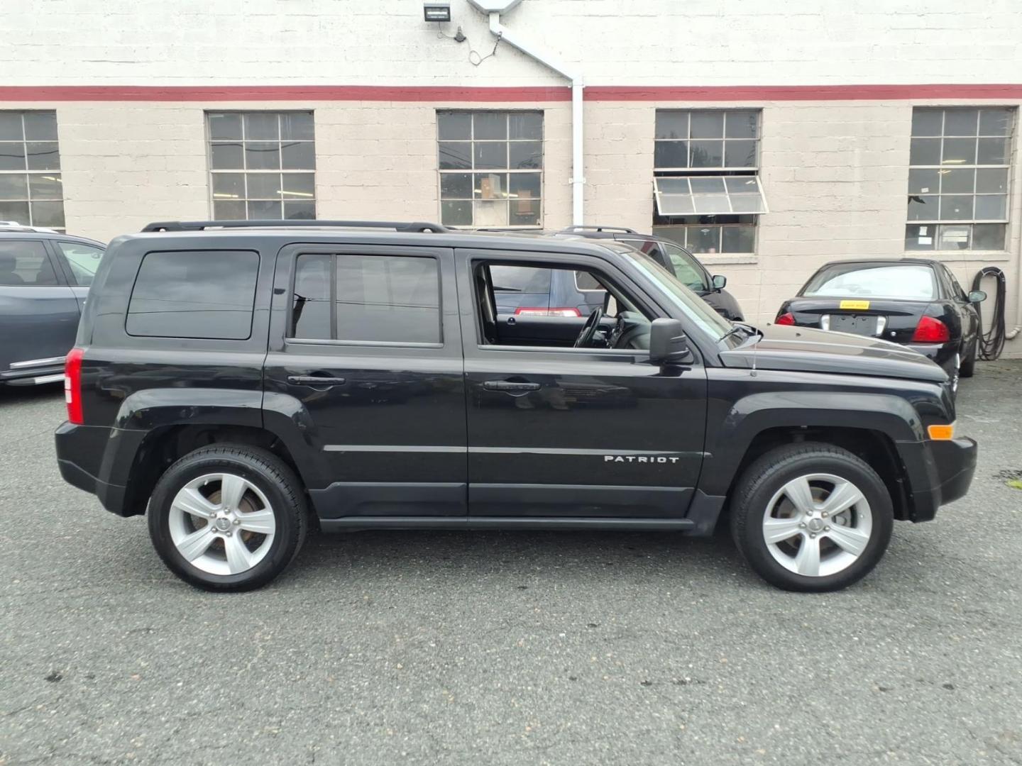 2011 Brilliant Black Crystal Pearl Coat Jeep Patriot Latitude (1J4NT1GA6BD) with an 2.0L 2.0L I4 158hp 141ft. lbs. Sequential-Port F.I. engine, Automatic transmission, located at 50 Eastern Blvd., Essex, MD, 21221, (410) 686-3444, 39.304367, -76.484947- Photo#5