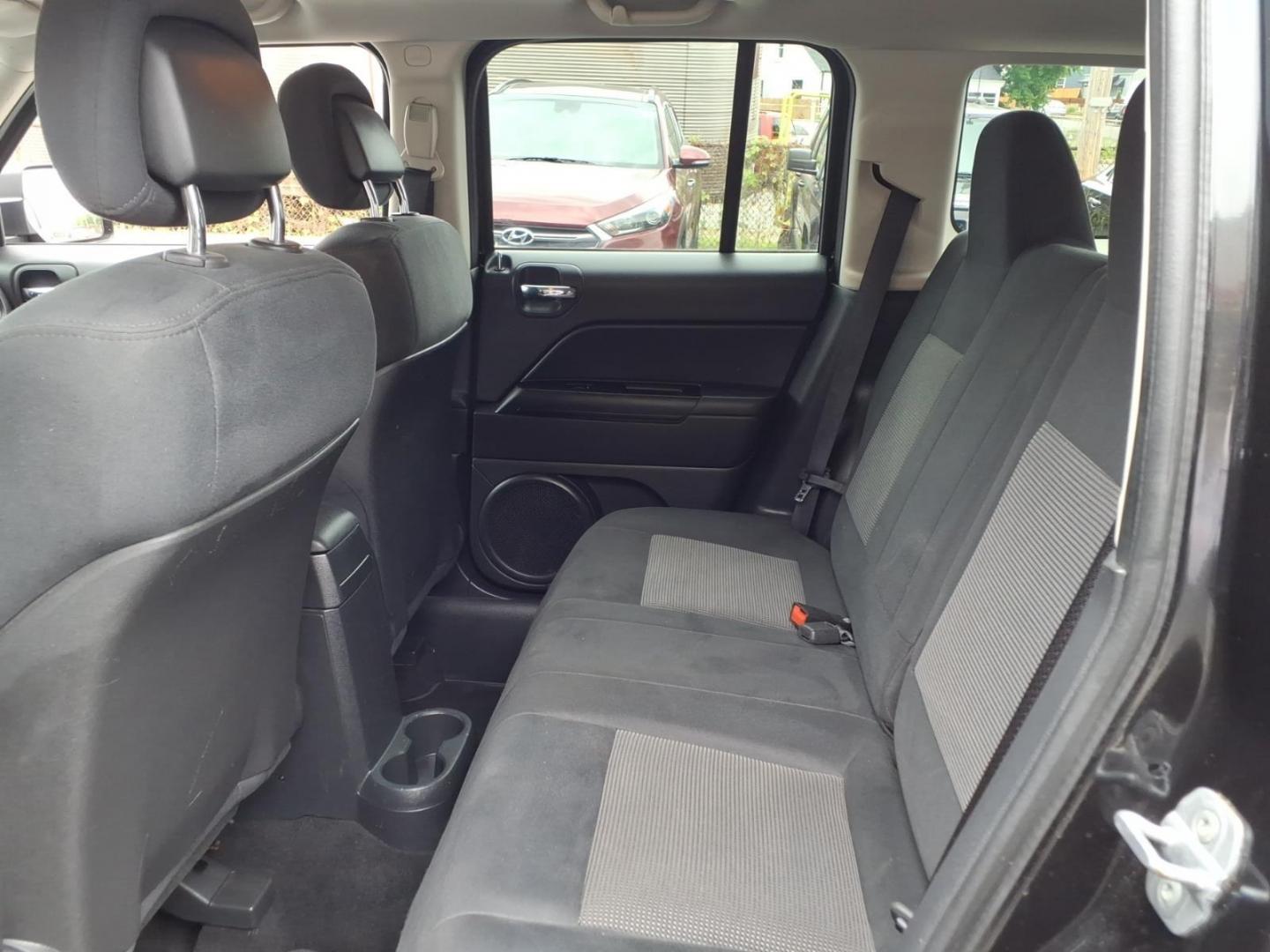 2011 Brilliant Black Crystal Pearl Coat Jeep Patriot Latitude (1J4NT1GA6BD) with an 2.0L 2.0L I4 158hp 141ft. lbs. Sequential-Port F.I. engine, Automatic transmission, located at 50 Eastern Blvd., Essex, MD, 21221, (410) 686-3444, 39.304367, -76.484947- Photo#10