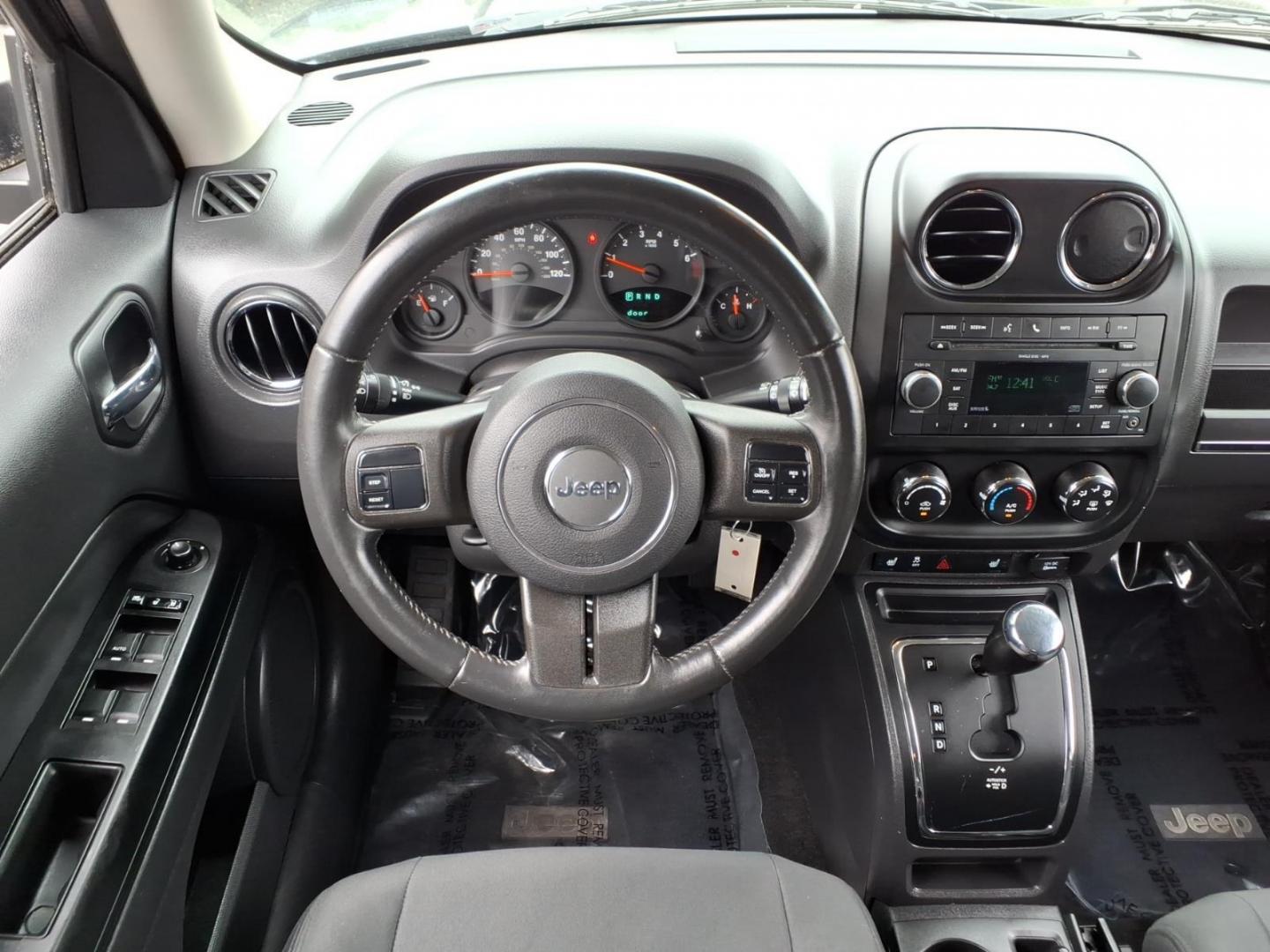 2011 Brilliant Black Crystal Pearl Coat Jeep Patriot Latitude (1J4NT1GA6BD) with an 2.0L 2.0L I4 158hp 141ft. lbs. Sequential-Port F.I. engine, Automatic transmission, located at 50 Eastern Blvd., Essex, MD, 21221, (410) 686-3444, 39.304367, -76.484947- Photo#14