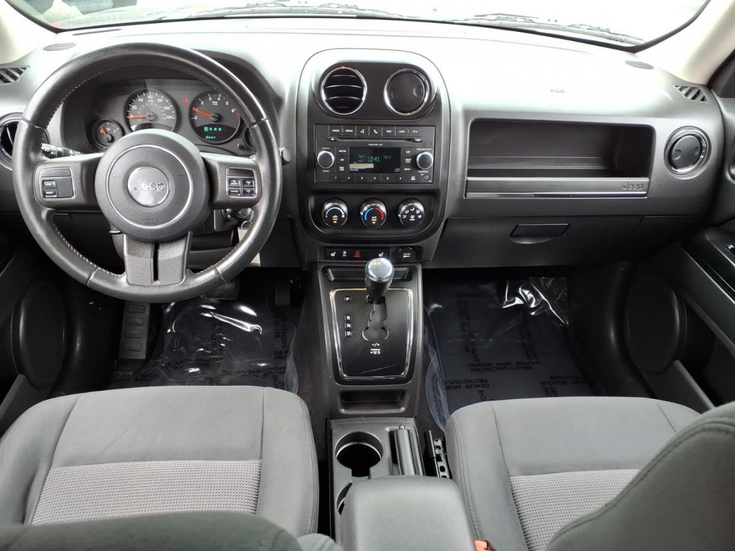 2011 Brilliant Black Crystal Pearl Coat Jeep Patriot Latitude (1J4NT1GA6BD) with an 2.0L 2.0L I4 158hp 141ft. lbs. Sequential-Port F.I. engine, Automatic transmission, located at 50 Eastern Blvd., Essex, MD, 21221, (410) 686-3444, 39.304367, -76.484947- Photo#15