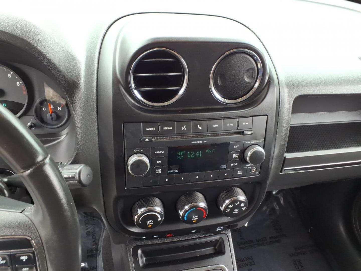 2011 Brilliant Black Crystal Pearl Coat Jeep Patriot Latitude (1J4NT1GA6BD) with an 2.0L 2.0L I4 158hp 141ft. lbs. Sequential-Port F.I. engine, Automatic transmission, located at 50 Eastern Blvd., Essex, MD, 21221, (410) 686-3444, 39.304367, -76.484947- Photo#16