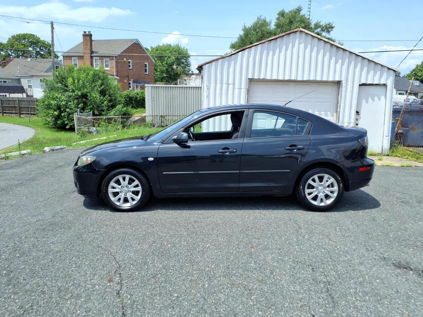 2007 Black Mazda Mazda3 (JM1BK32F171) with an 2.0L 4 Cylinder Fuel Injected engine, Automatic transmission, located at 50 Eastern Blvd., Essex, MD, 21221, (410) 686-3444, 39.304367, -76.484947- Photo#1