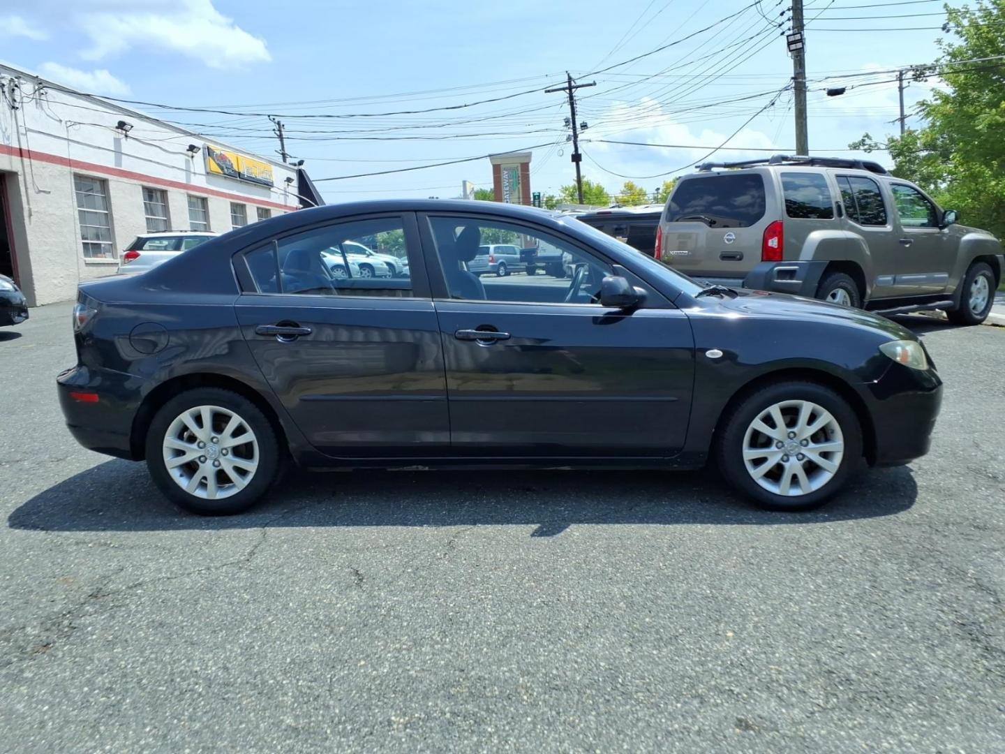 2007 Black Mazda Mazda3 (JM1BK32F171) with an 2.0L 4 Cylinder Fuel Injected engine, Automatic transmission, located at 50 Eastern Blvd., Essex, MD, 21221, (410) 686-3444, 39.304367, -76.484947- Photo#5