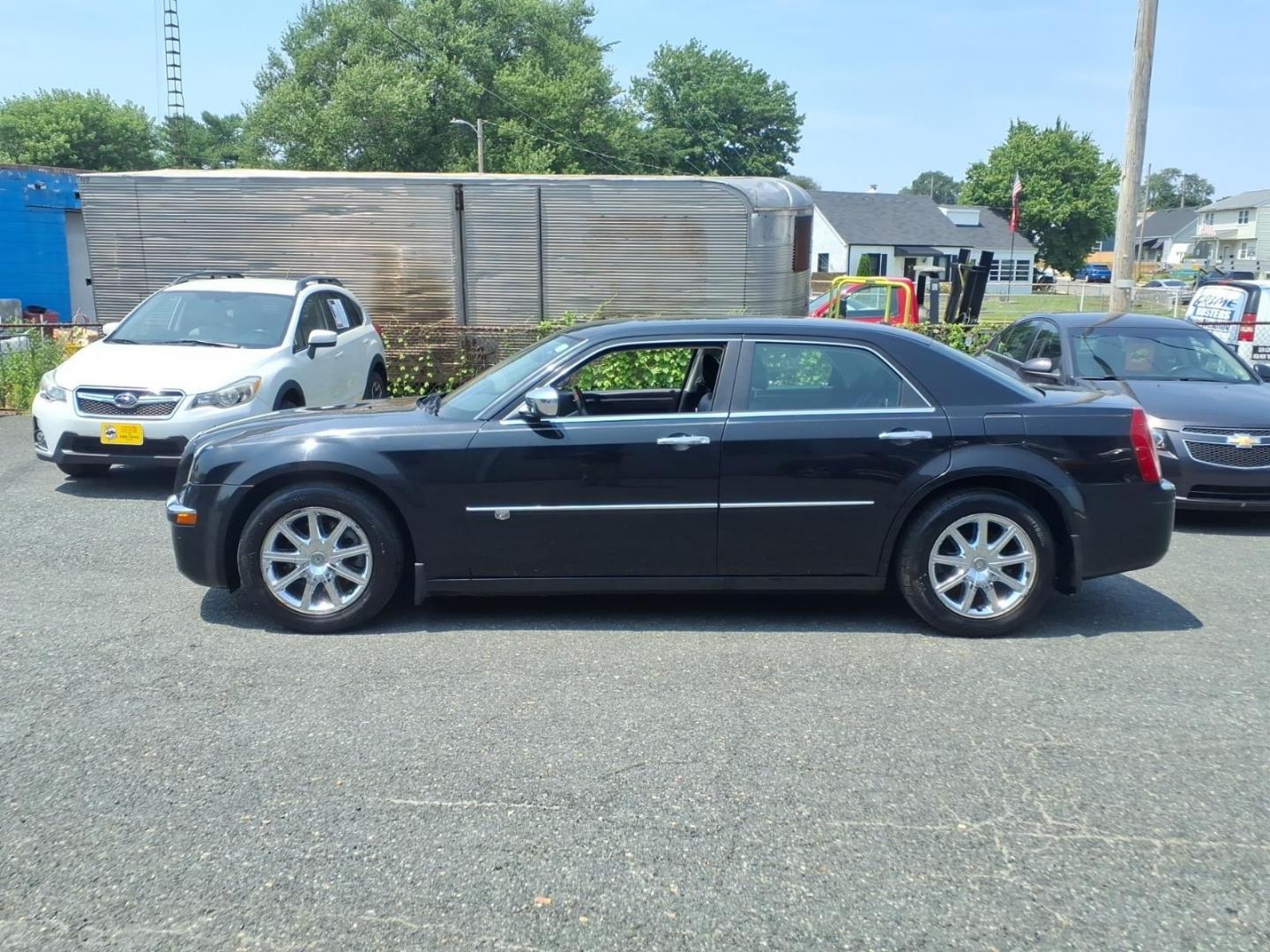 2009 Gray Chrysler 300 C HEMI (2C3KA63T09H) with an 5.7L 8 Cylinder Sequential-Port F.I. engine, Automatic transmission, located at 50 Eastern Blvd., Essex, MD, 21221, (410) 686-3444, 39.304367, -76.484947- Photo#1