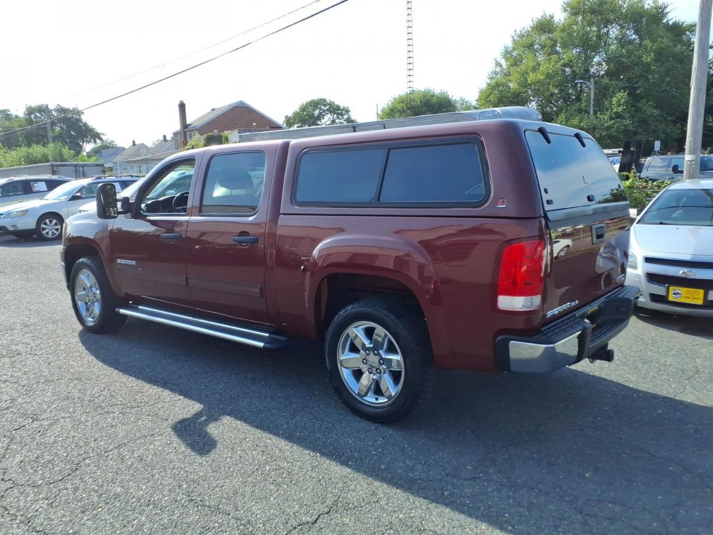 2013 Sonoma Red Metallic GMC Sierra 1500 SLE (3GTP1VE03DG) with an 5.3L 8 Cylinder Sequential-Port F.I. engine, Automatic transmission, located at 50 Eastern Blvd., Essex, MD, 21221, (410) 686-3444, 39.304367, -76.484947- Photo#2