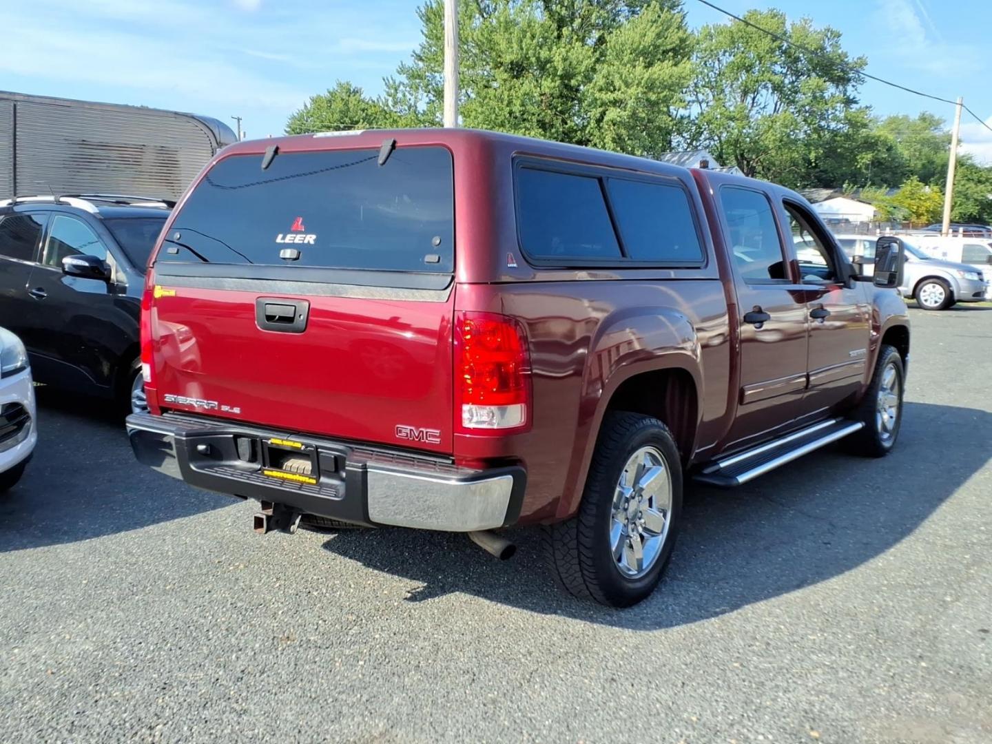 2013 Sonoma Red Metallic GMC Sierra 1500 SLE (3GTP1VE03DG) with an 5.3L 8 Cylinder Sequential-Port F.I. engine, Automatic transmission, located at 50 Eastern Blvd., Essex, MD, 21221, (410) 686-3444, 39.304367, -76.484947- Photo#4